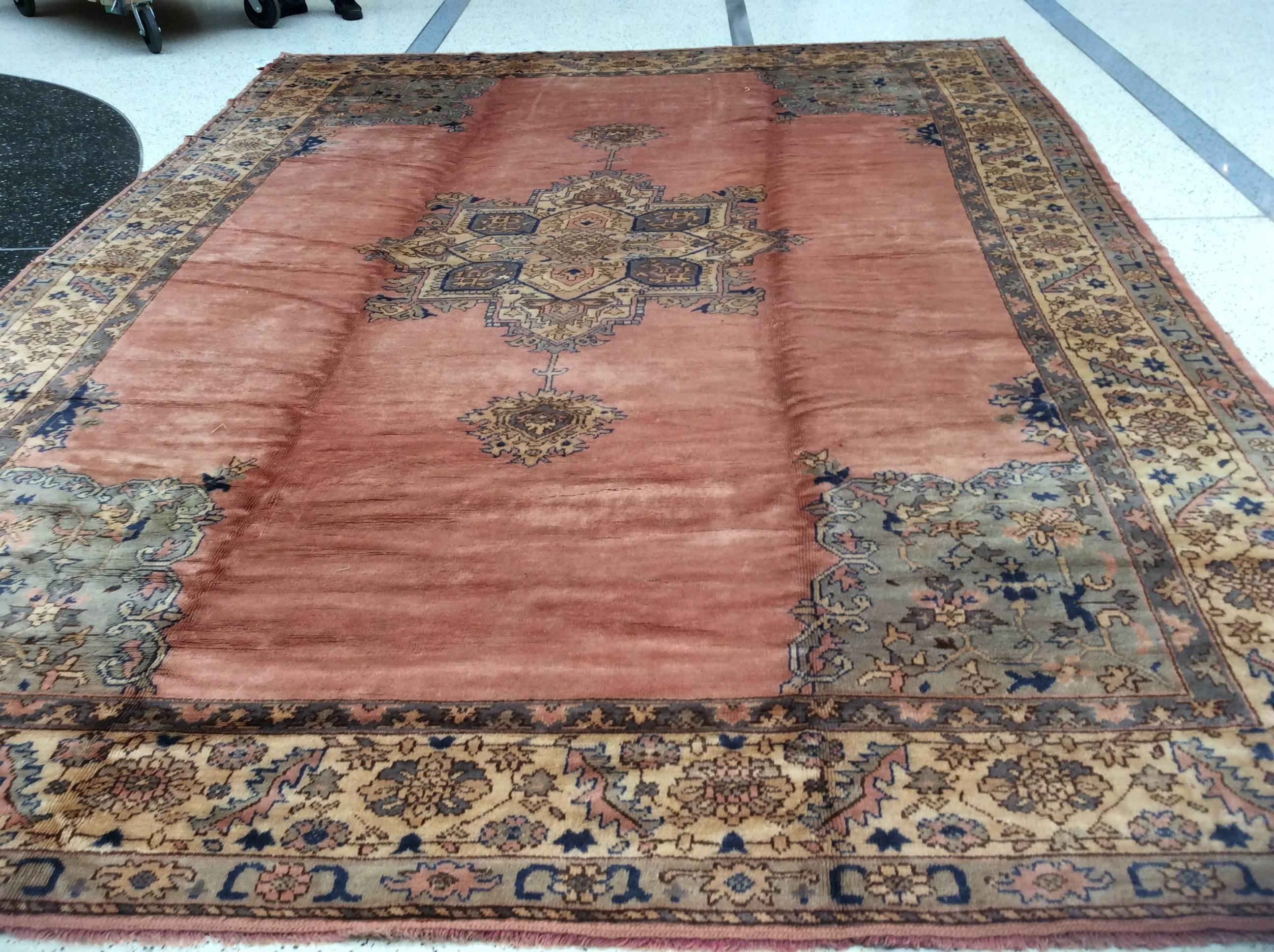Antique Oushak rug.

Measurement: 10'10
