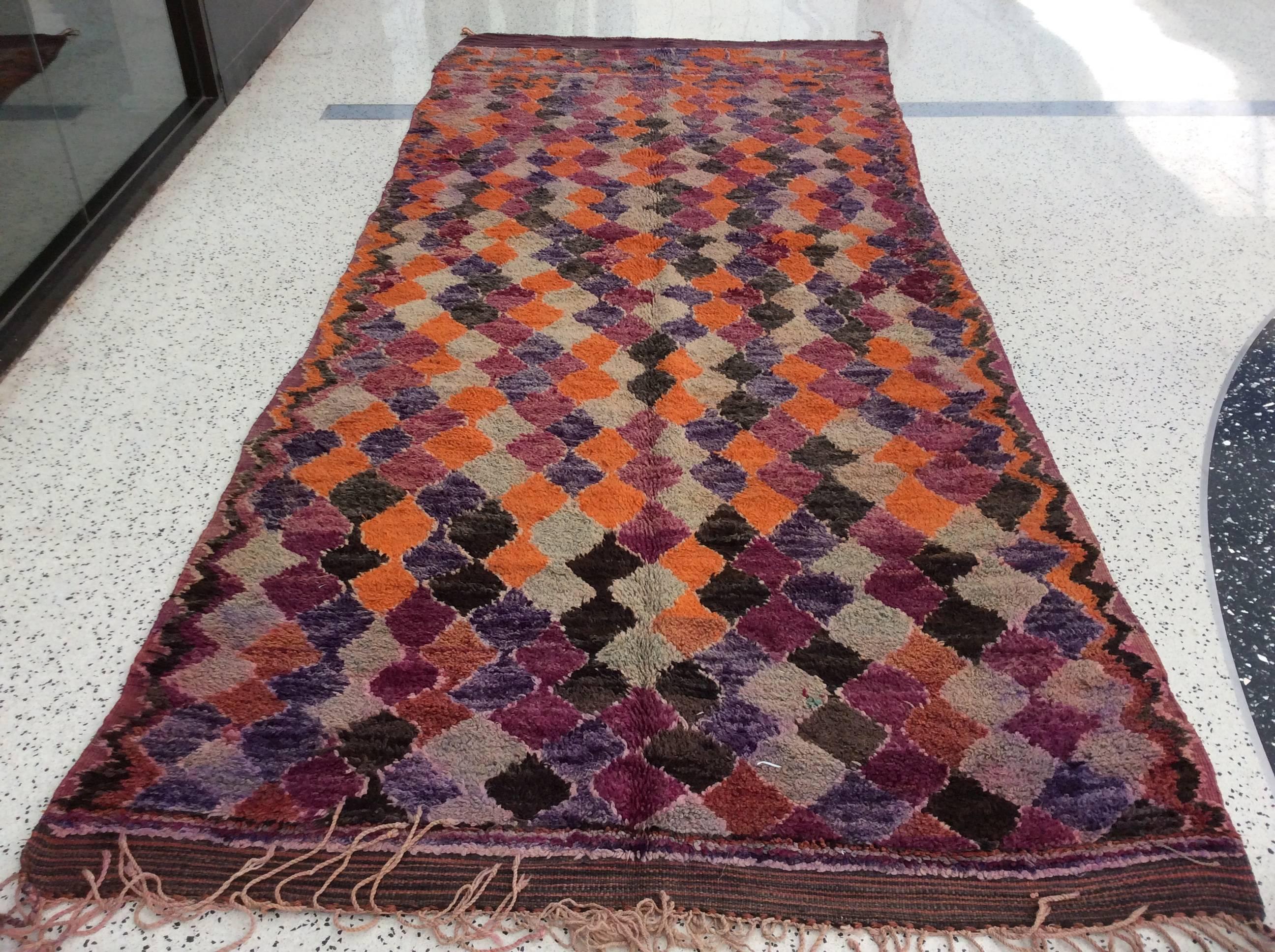 Purple orange Moroccan rug

A weaving technique that has been passed down from generations to generations makes Moroccan Berber rug such a fine addition to your collection. It is made of luxurious hand-spun wool by the high atlas tribe, no two