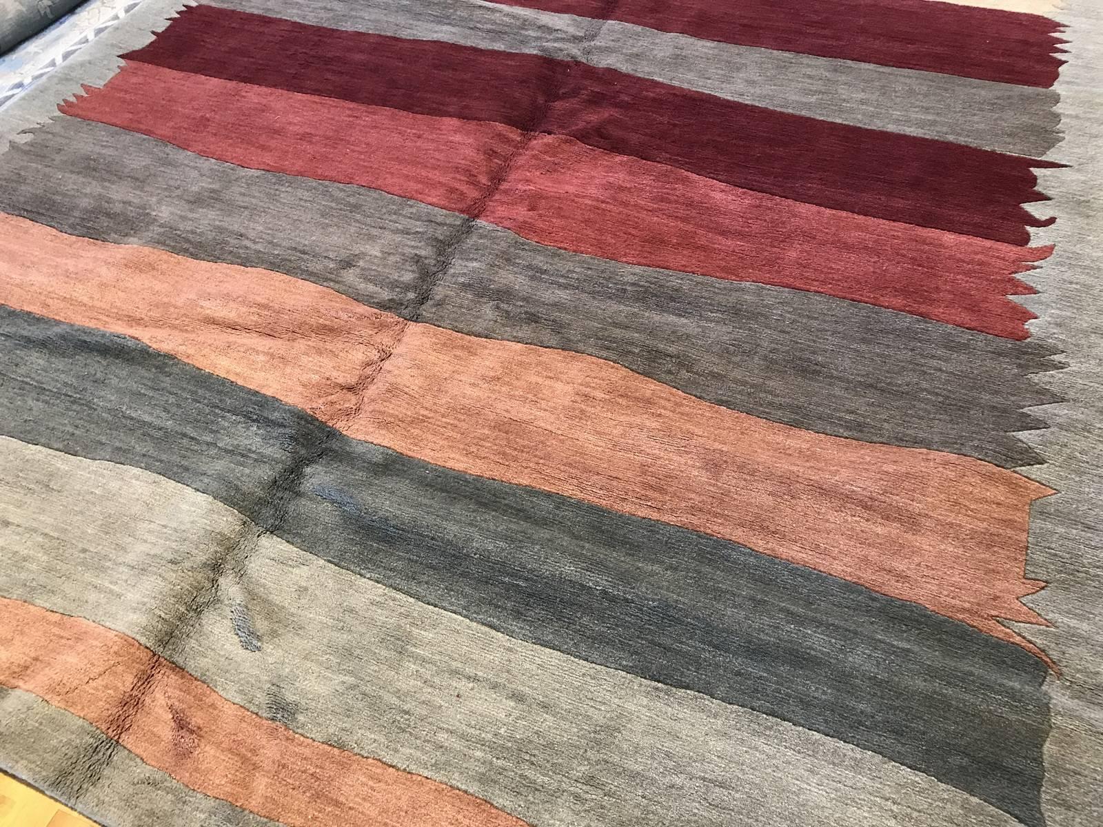 Multi-color Stripe rug
Colors: Reds, blues, golds, greens, taupe, beige, brown, grey.