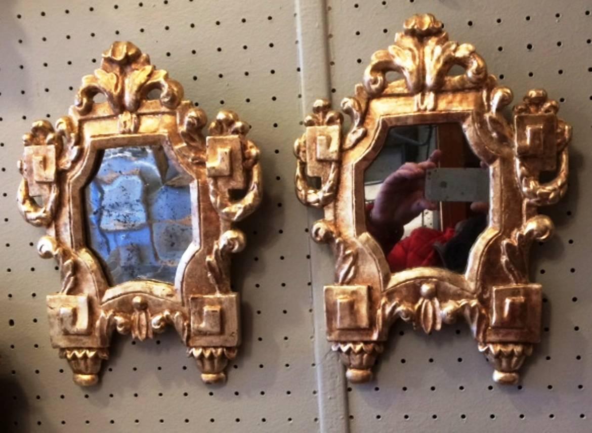 Nice pair of Italian, 18th century carved giltwood mirrors, 
the gilding was done with white gold leaves
probably Roman,