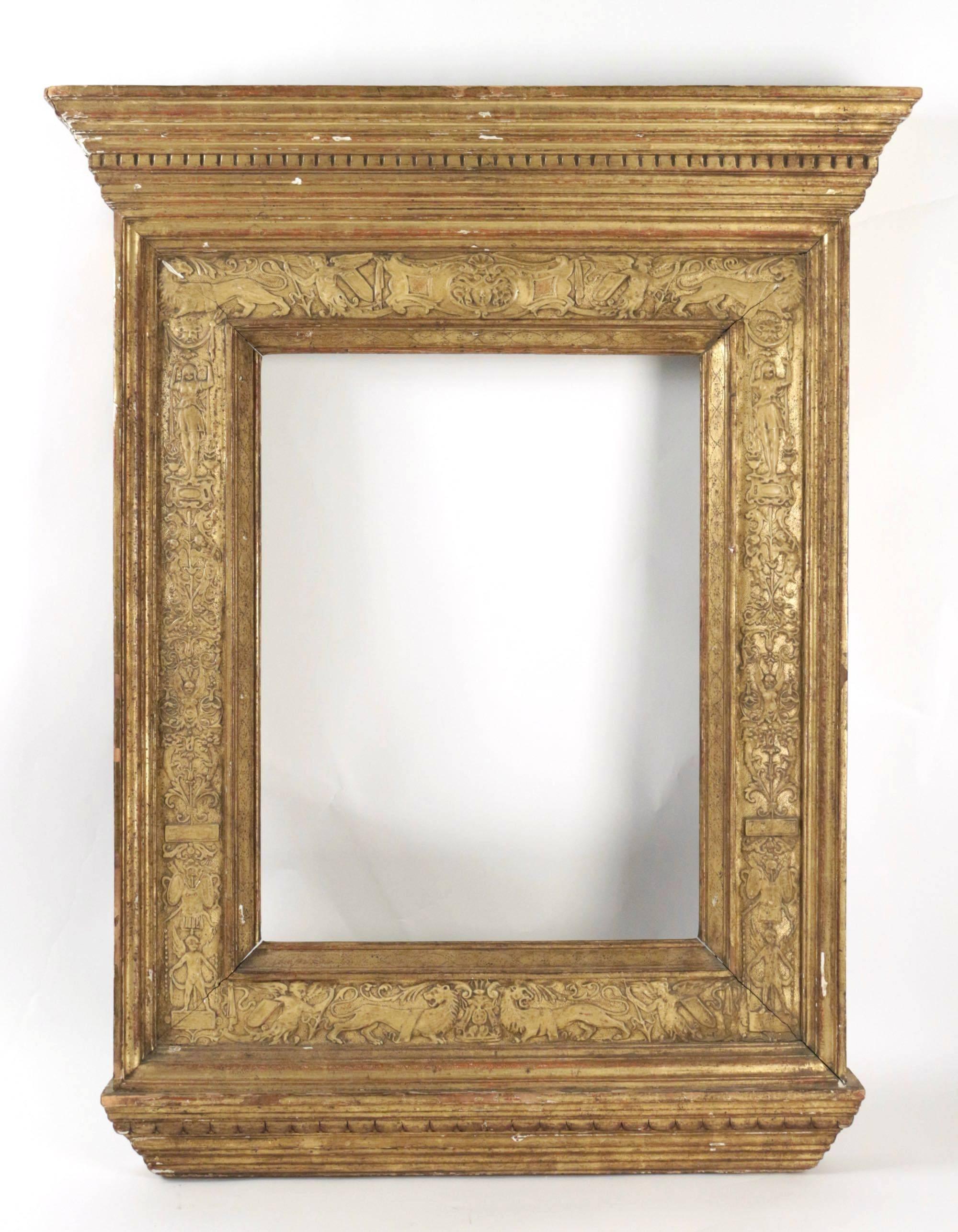 Italian Renaissance style frame mounted as mirror, Italy, late 19th century.
Carved giltwood and gilded gesso with a decor of animals, flowers, scrolls and putti.
As a frame, sight size is 48 cm, H 36 cm W.
