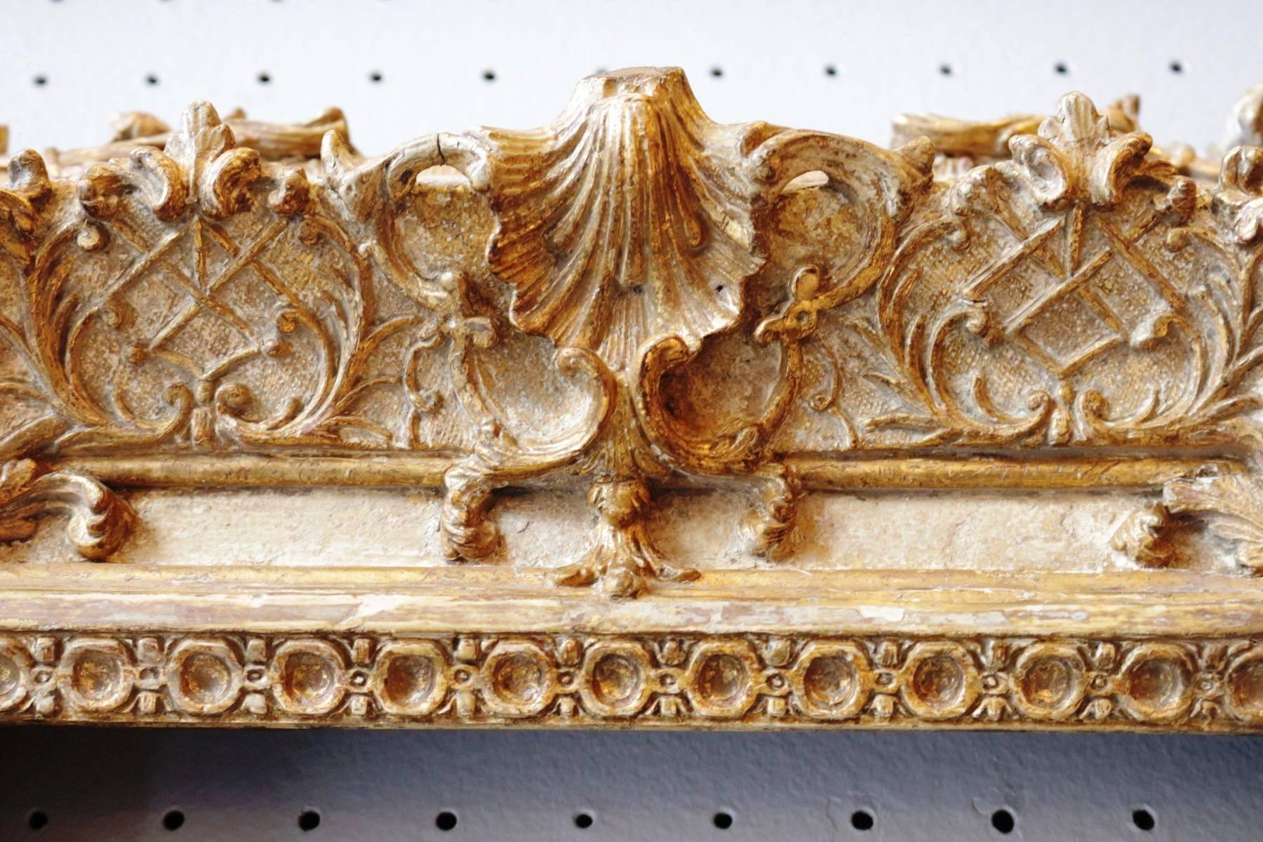 Exceptional Royal Quality French Regence frame mounted as mirror, France, 1720s
carved giltwood
the most extraordinary carving and gilding ever seen on a frame.
Illustrated in the catalogue of the exhibition 