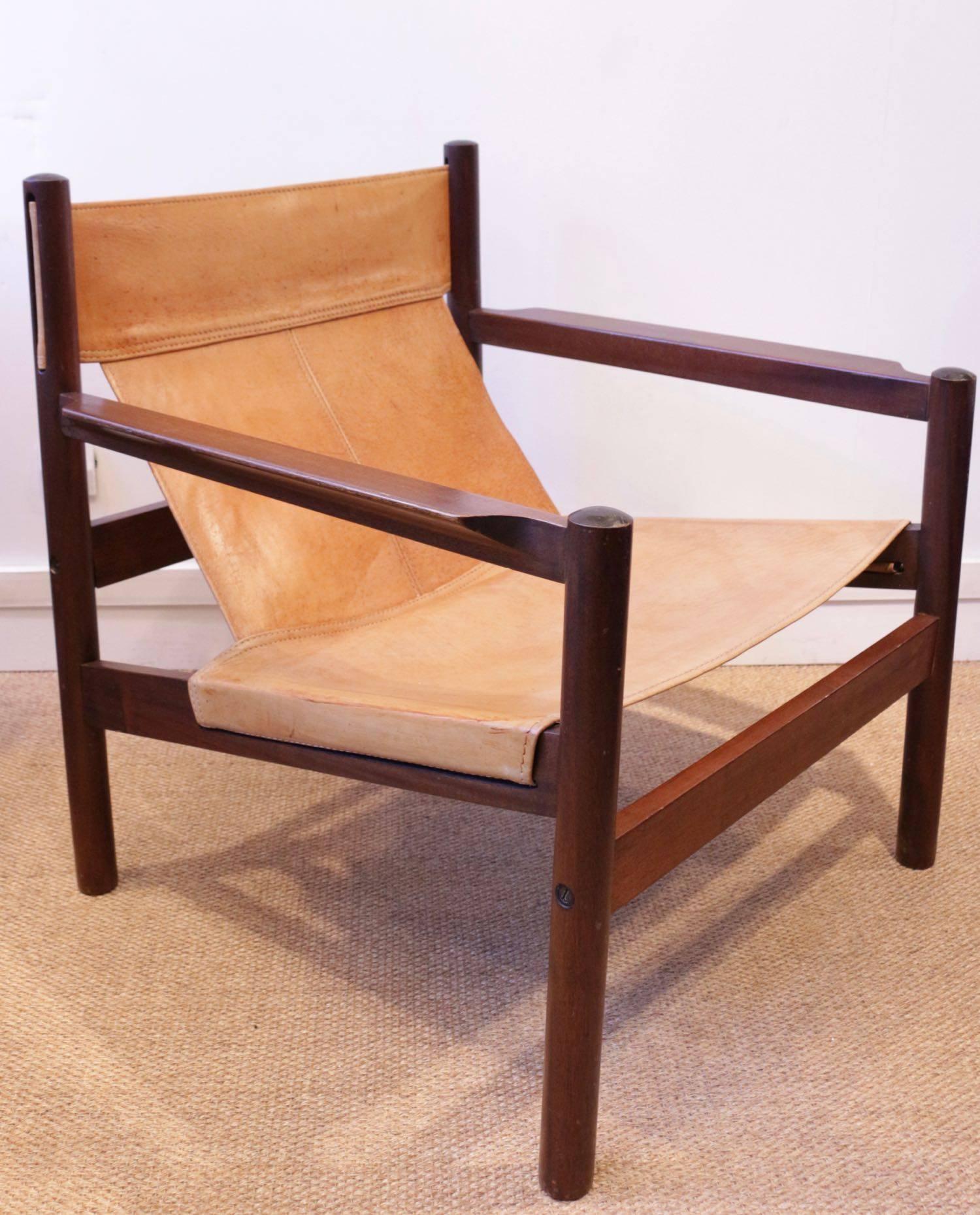 Very elegant and comfortable pair of safari armchairs by Michel Arnoult, 1960s.
Light brown leather.