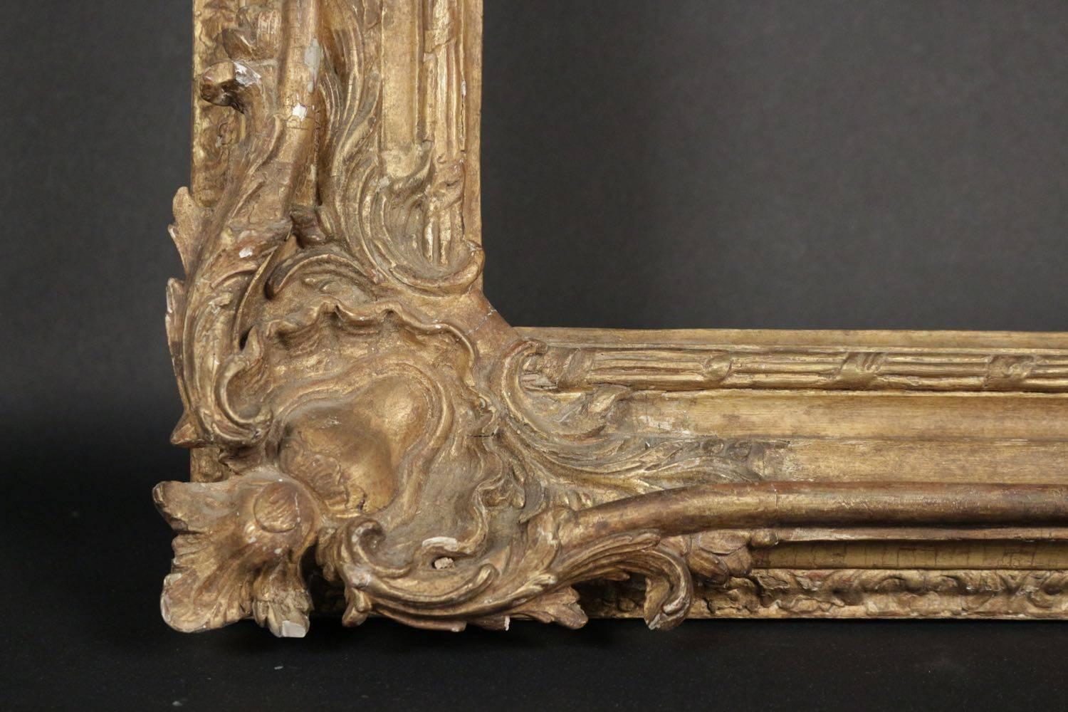 Exceptional Louis XV period royal frame mounted as mirror, 18th century
carved giltwood, with royal 