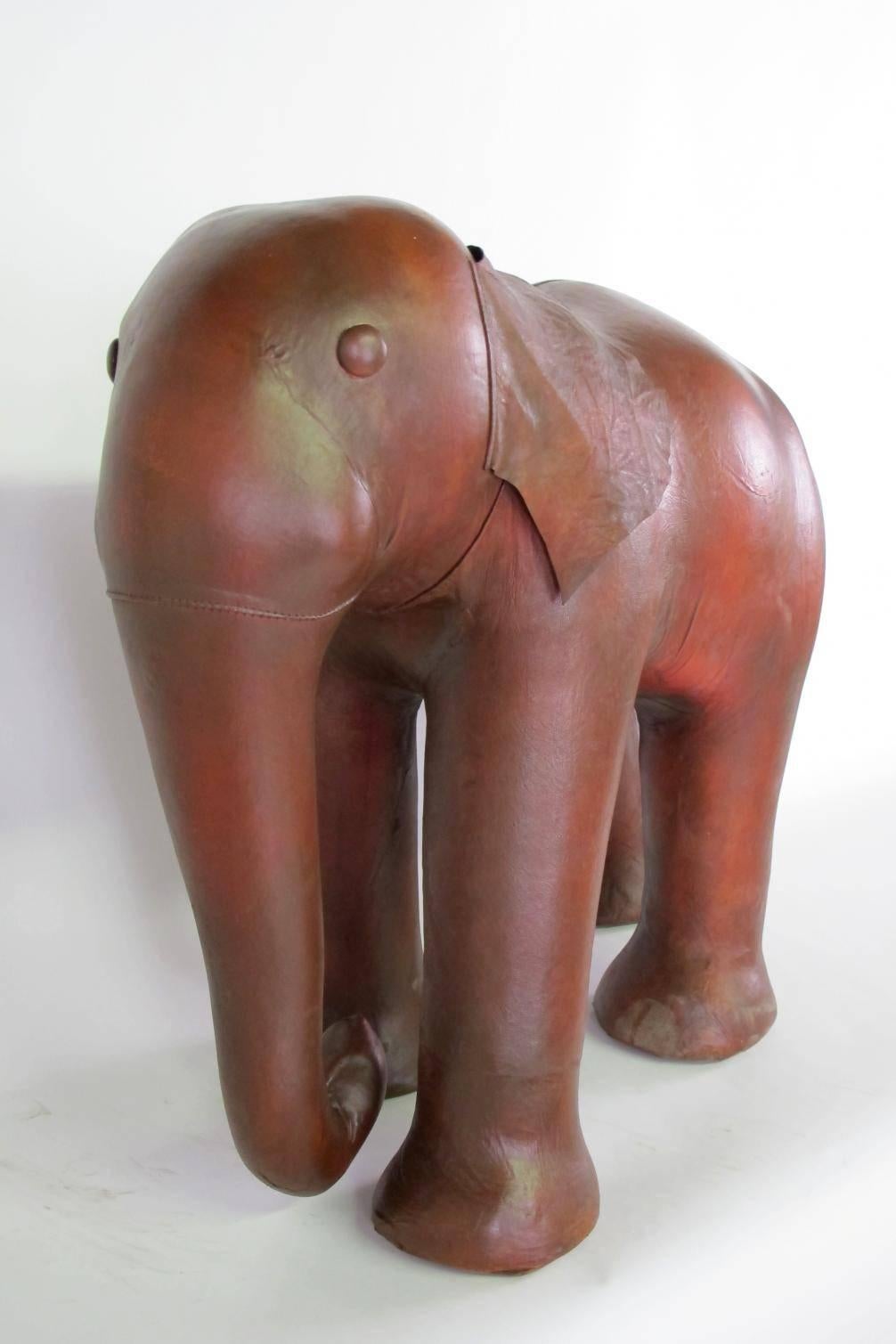 Originally produced in Kenya, this vintage leather elephant is stout enough to be used as additional seating or as a footstool with a substantial weight and smooth leather finish. Ears can either lay flat or we like the whimsical look in the gallery