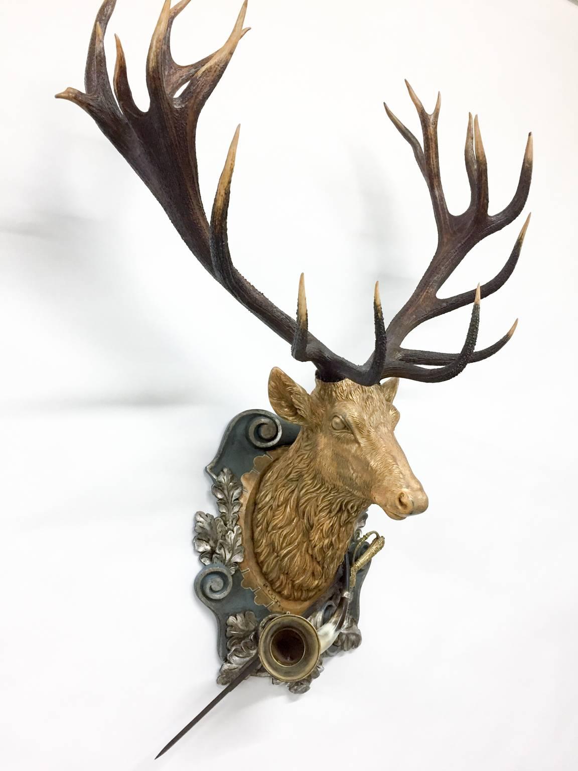 19th century red stag trophy originally from Emperor Franz Joseph's castle in Eckartsau in the Southern Austrian Alps. The red stag carving itself is a newly carved red stag with the 19th century Habsburg/Eckartsau antlers. The head and plaque are