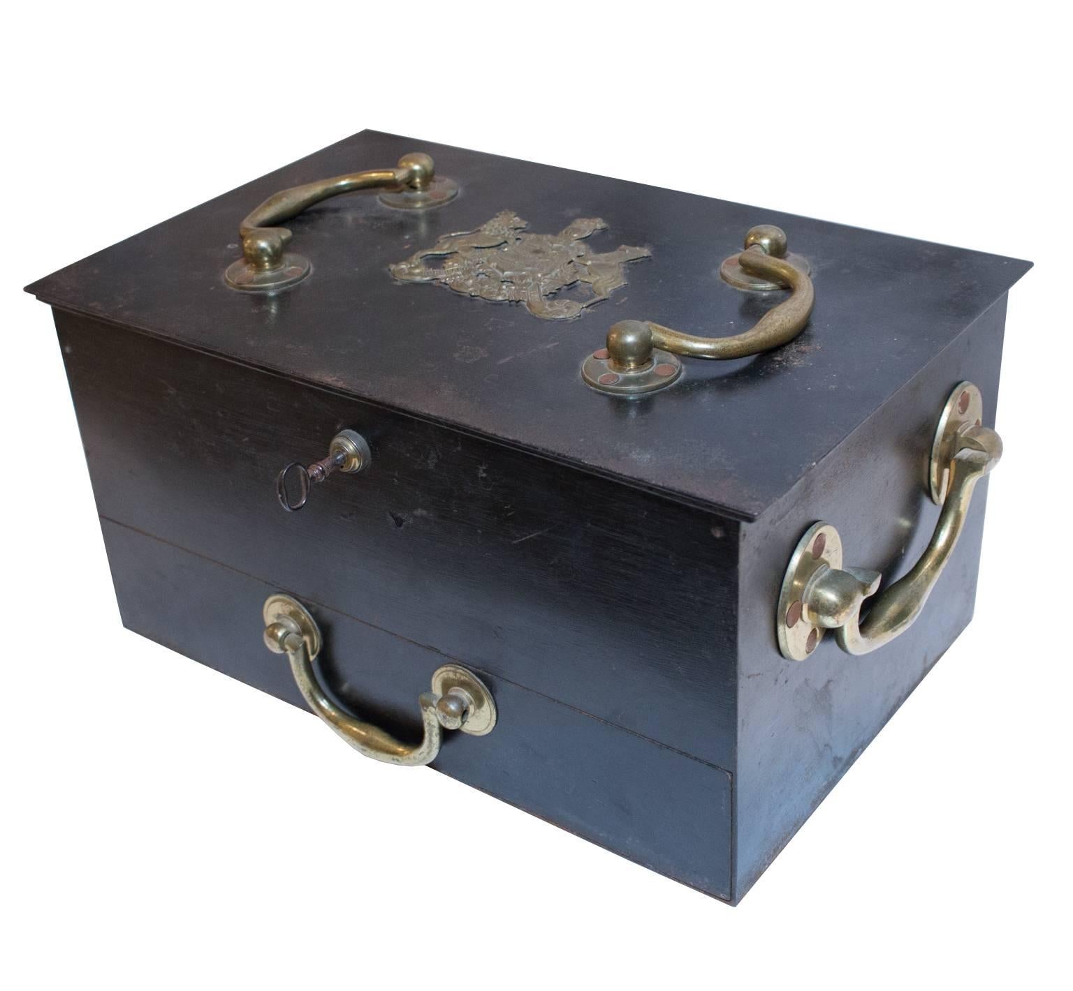 A true treasure discovered during our recent time in Europe, this heavyweight cash box from England features the original key and working lock with a pin that removes to open the lower drawer. Stamped on the inside J.Bramah 124 Piccadilly, London,