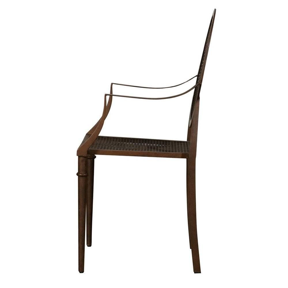 The elegant Mary garden chair is inspired by Classic Louis XV seating, crafted from welded iron with a timeless rust finish. This beauty is perfect for indoor and outdoor use. Measures: 38" H x 21" W x 19.5" L.  Four currently in
