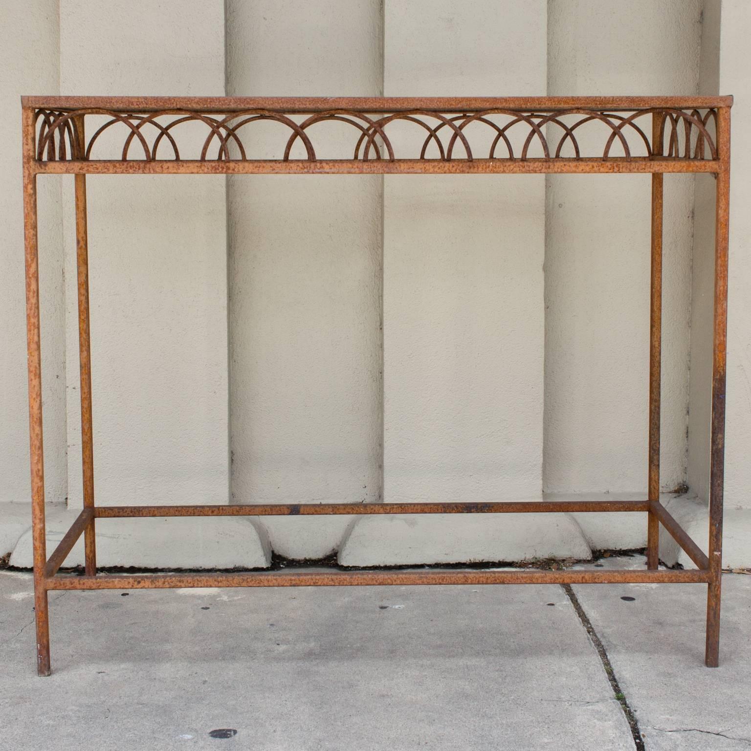 Discovered during our recent time in France, we just love this unique antique French bar height iron and glass console table that once graced a flower shop in Paris. We also have the matching pair of tables in another listing. Suitable for indoors
