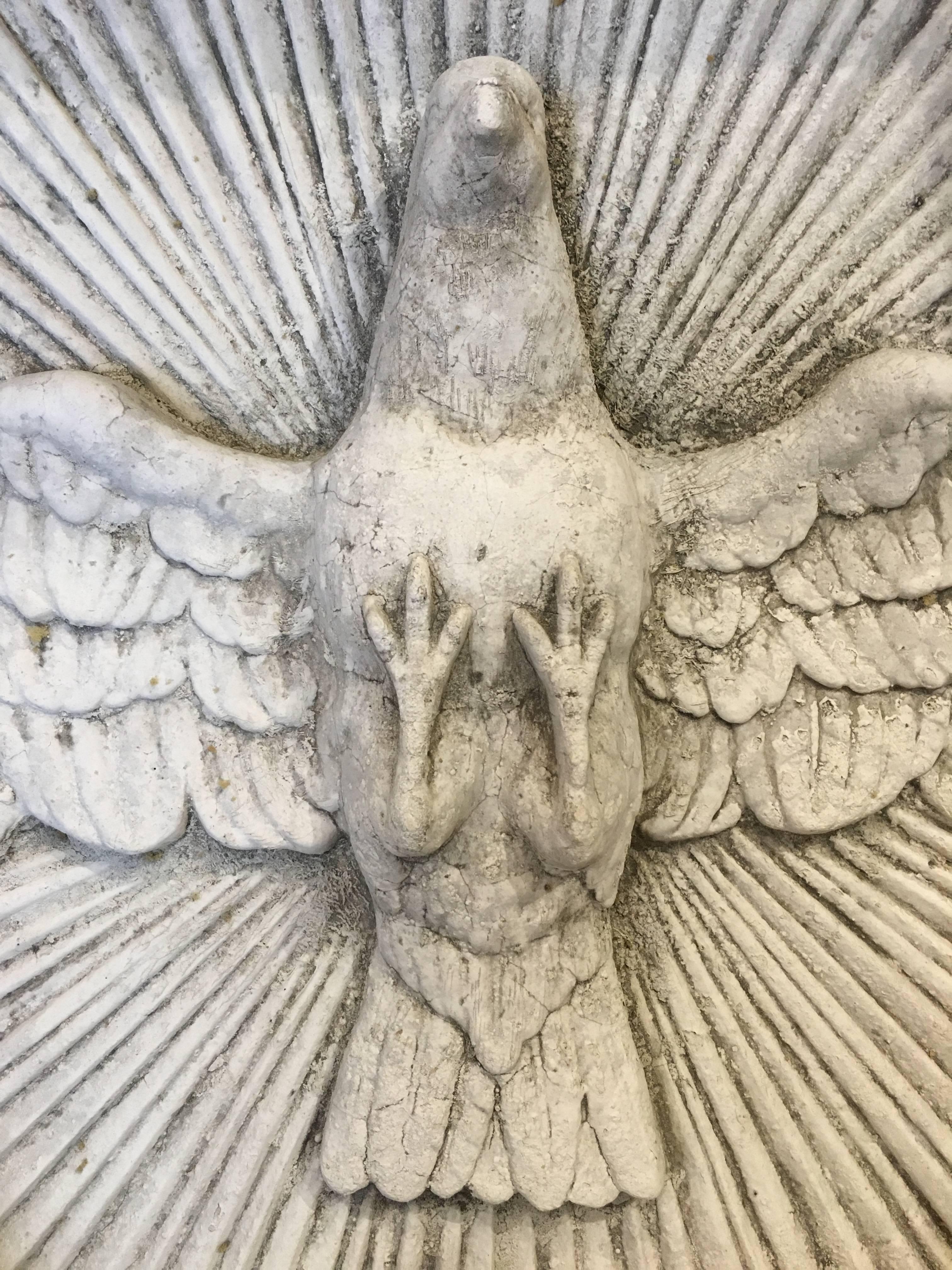 Lovely work of art cast in stone and handcrafted by a favourite artisan friend from our travels. Equally beautiful both indoors in the home or hung out in the garden along an ivy covered wall. Truly beautiful piece symbolic of the Holy Spirit