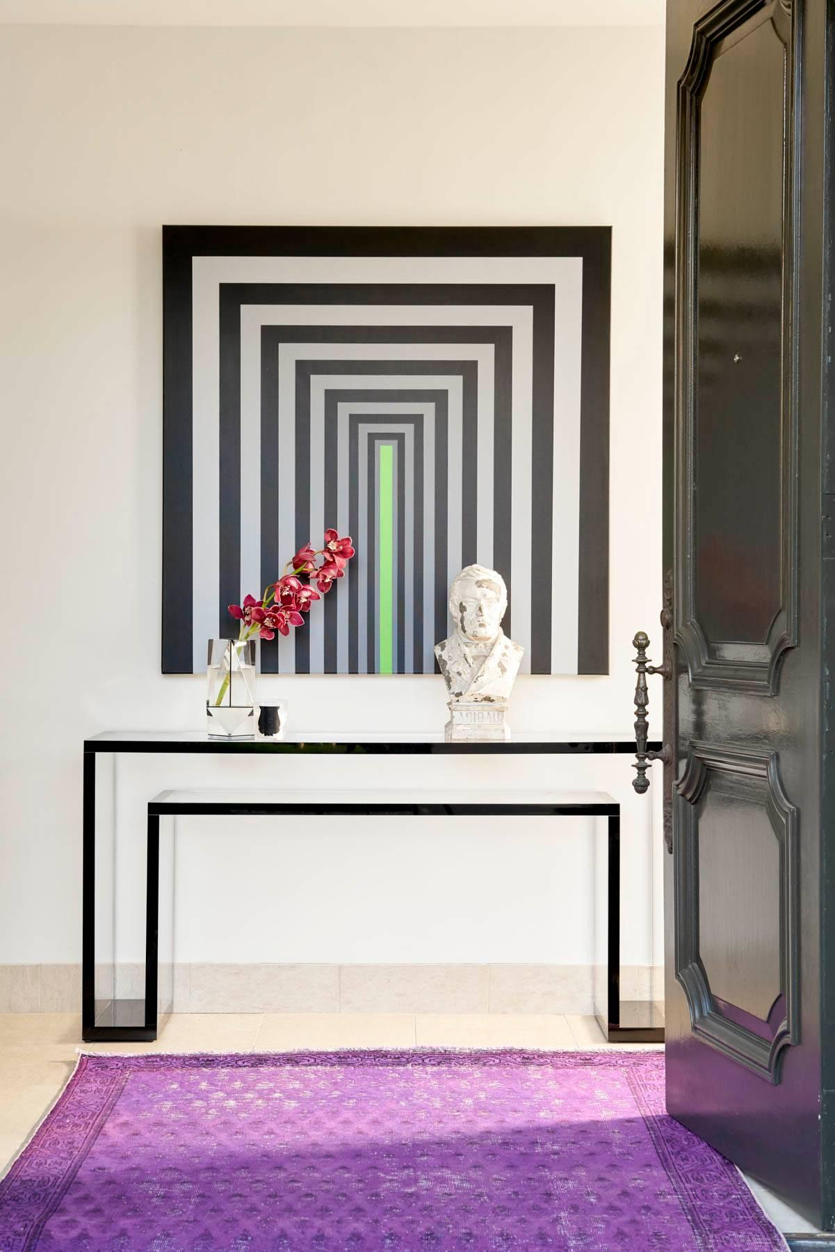 Alexandra Von Furstenberg Stealth console table in opaque black.
Modeled after the popular Brilliant console, the Stealth console is just as the name implies. It's sleek and streamlined with a glossy finish. It's great for adding sophisticated