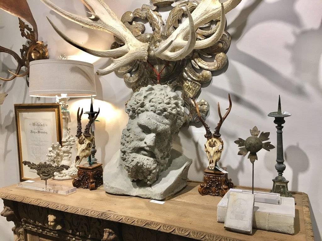 We like to think this as the stone reincarnation of Hercules in all his glory. Hypertufa stone piece that is meant to be rustic looking with indentations due to the stone casting process, this is stunning tabletop piece or acquiring light mossing