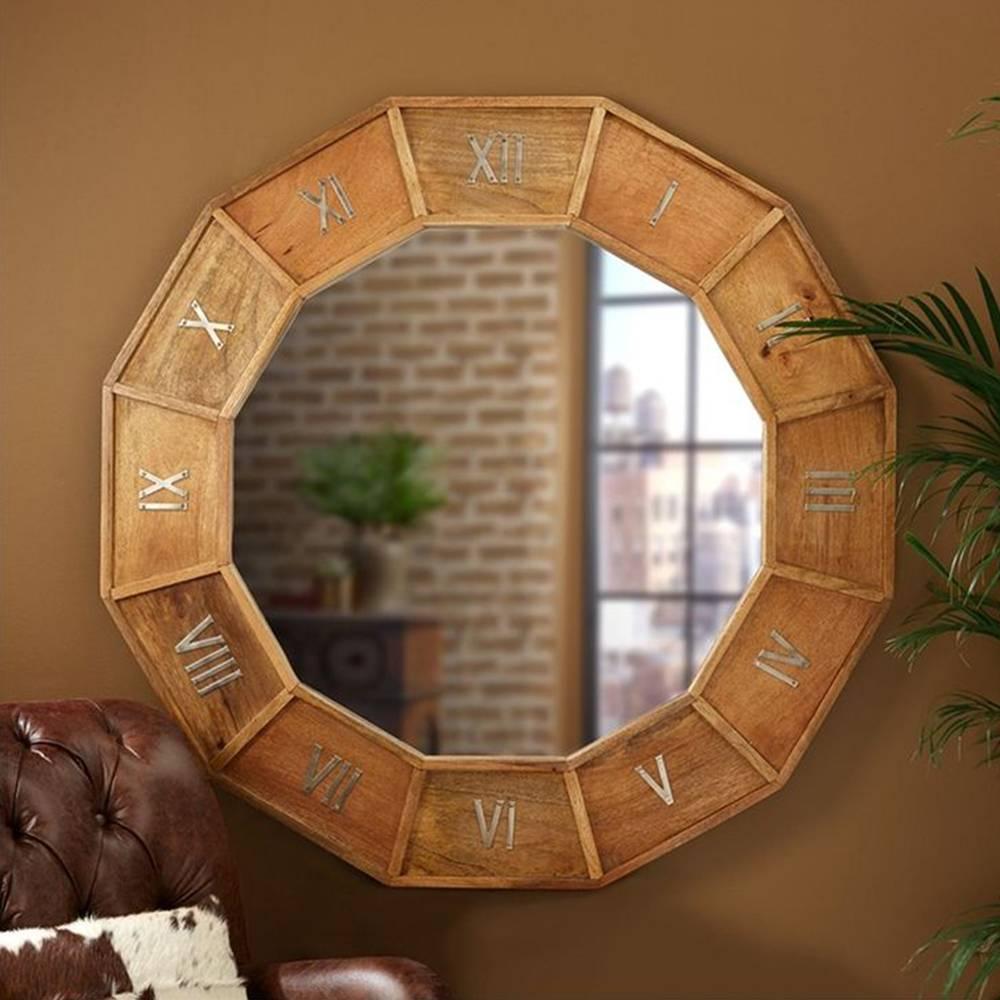 Reminiscent of the beauty of the Musee D'Orsay's clock face in Paris, this handcrafted wooden mirror features nickel Roman numeral accents all around the mirror and makes for a beautiful statement piece.

Measures 47" H x 47" W x 3"