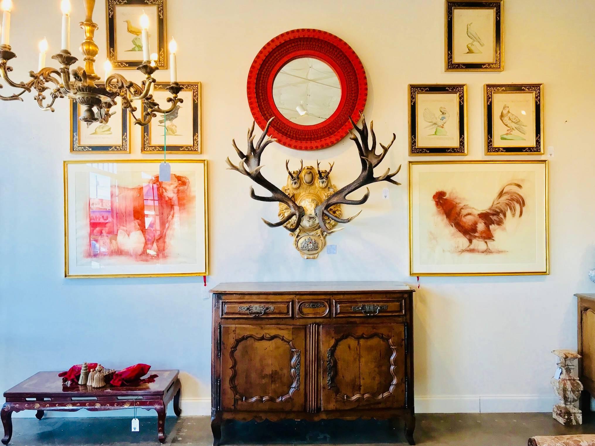 This nineteenth century red stag with pairing of roe trophies features an exquisite hand-carved gilt plaque, decorated with the emblem of St. Sepulcre, a division of the Knights Templar. This piece also features the original hardware of Kaiser