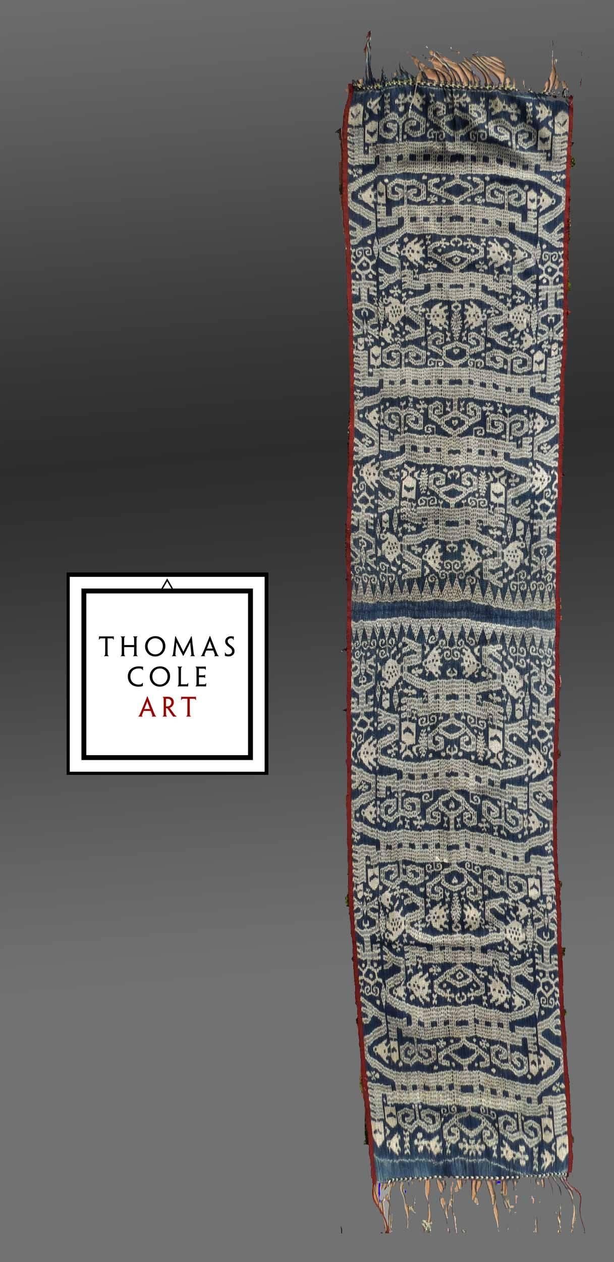 A man's cloth belt from West Timor, composed of cotton woven in utilizing an Ikat technique. Mounted, and hung in the right place, it presents a wonderful image hearkening back to our most Primitive roots as members of the human species. 

The