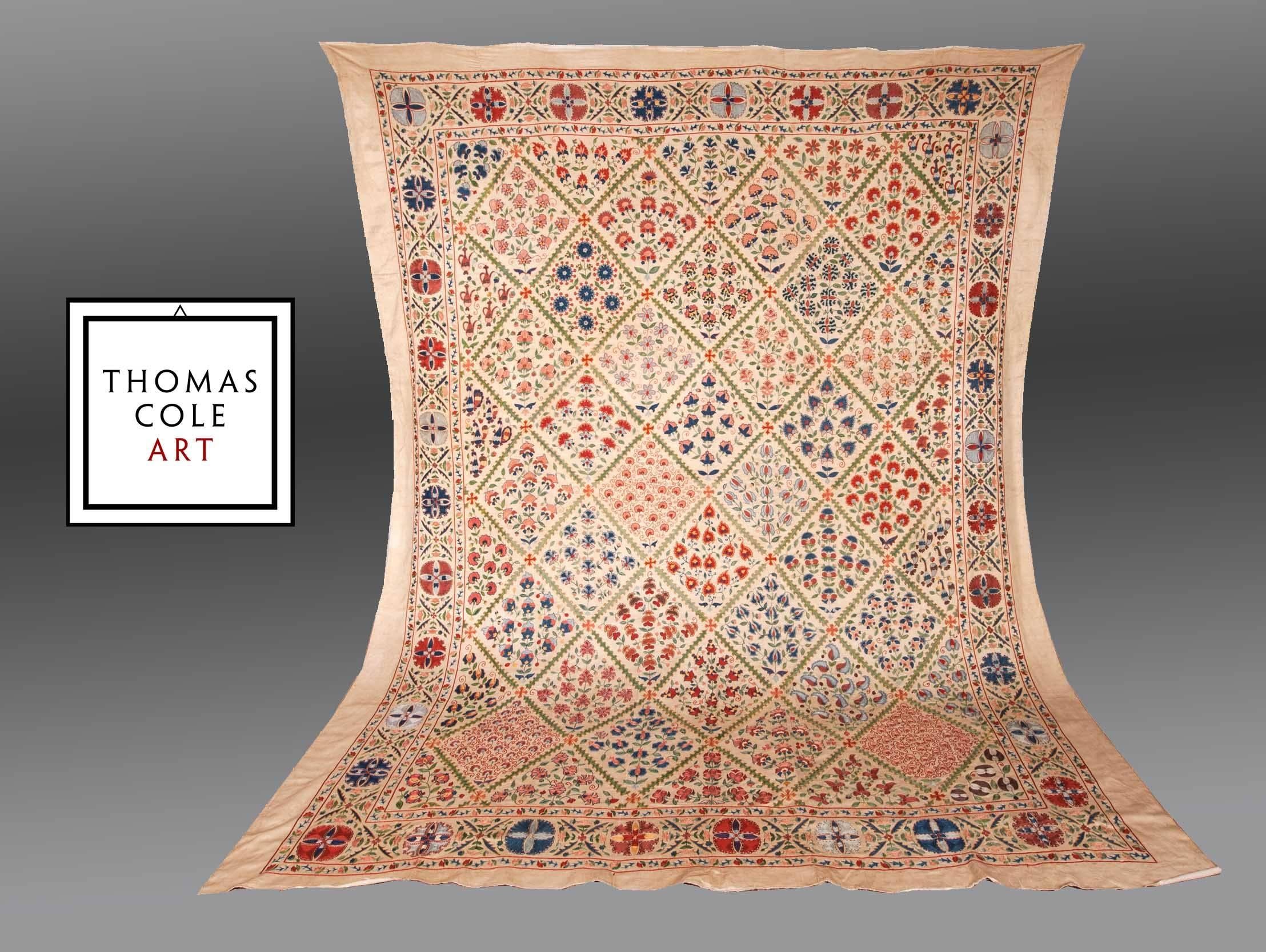 A finely executed, beautifully designed contemporary Uzbek embroidery (or 'suzani'). Quite large at 8.5 feet by 10.5 feet, it is ideally suited to be used as a luxurious bedspread or, if one has the space, an elegant wall hanging!

The