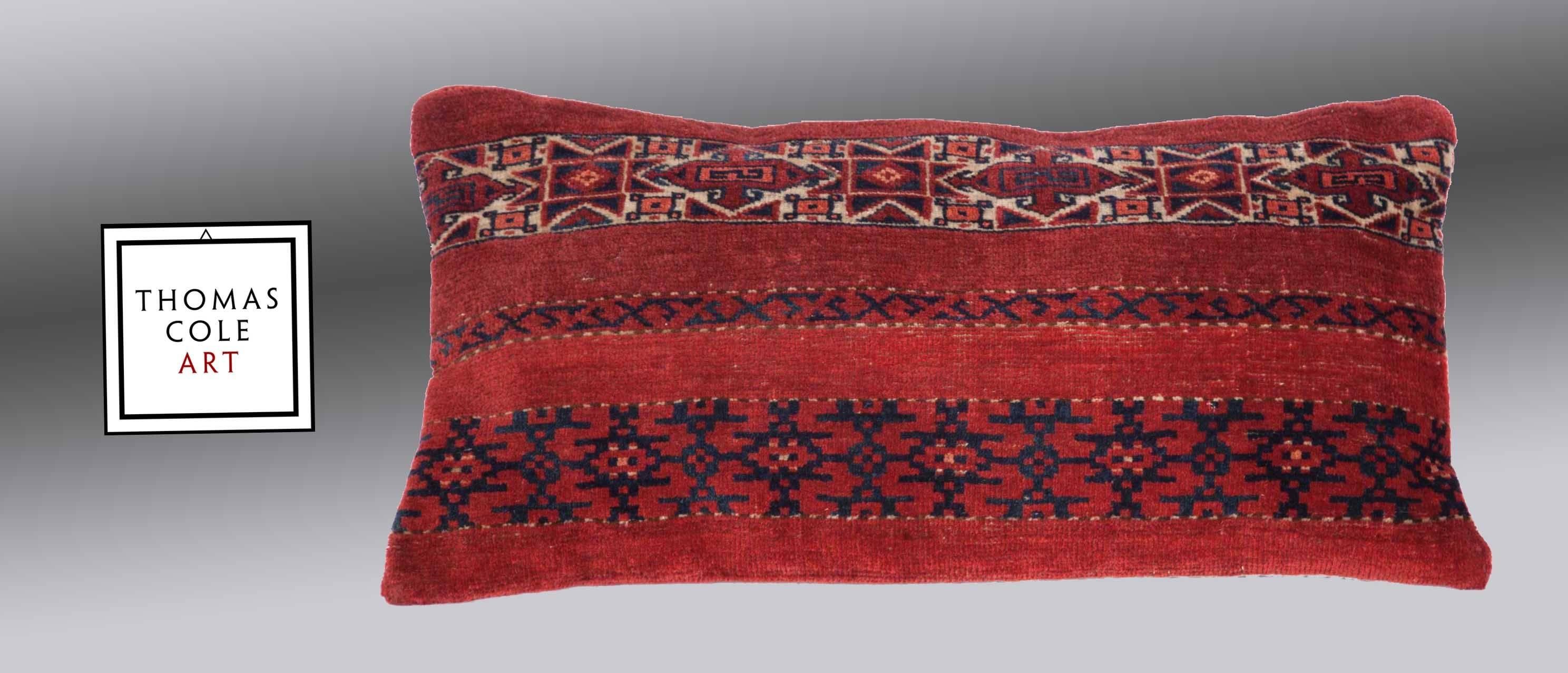 A pillow fashioned from a colorful Ersari Turkmen tribal rug. Measures: 31.5