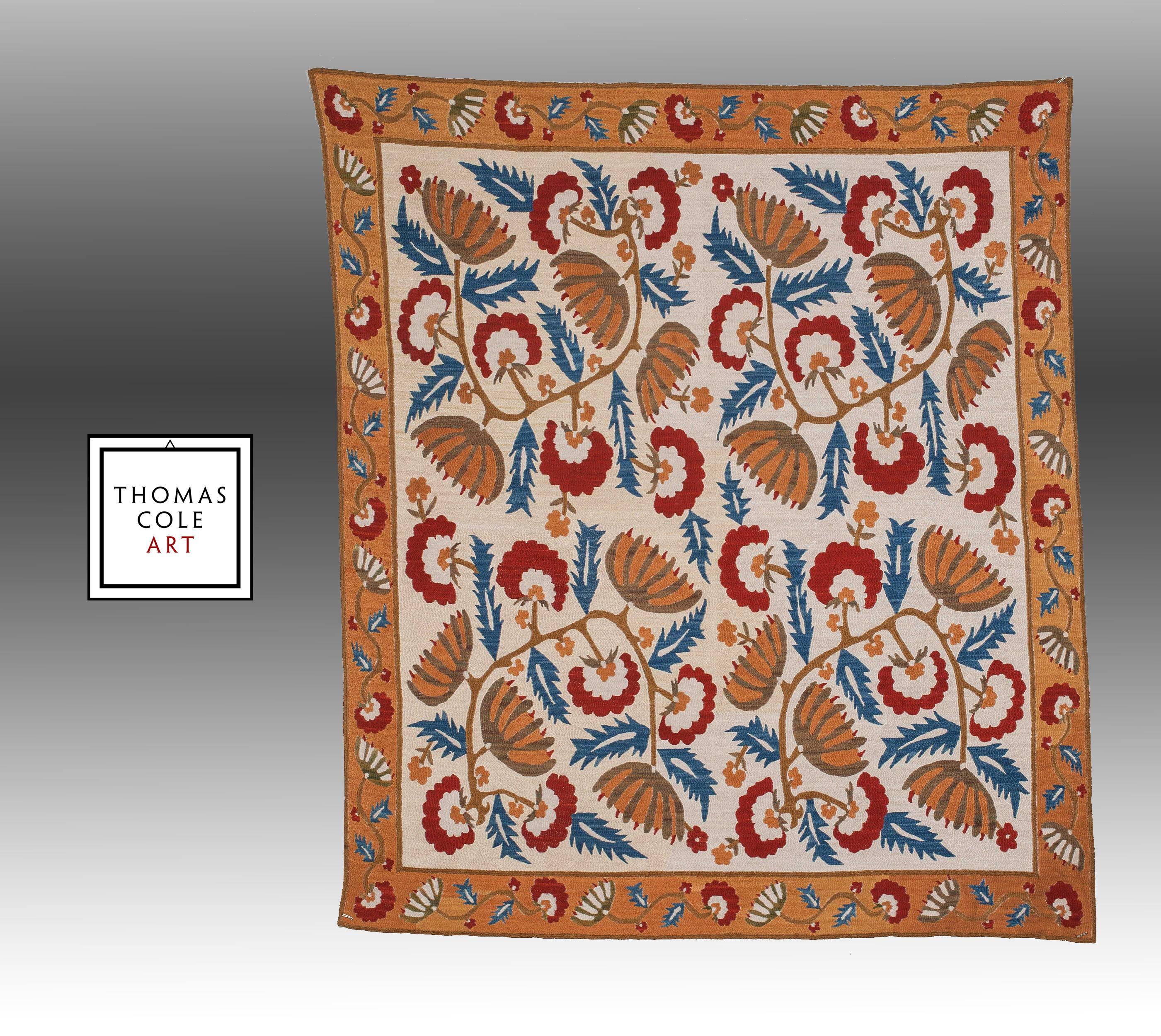 An incredibly beautiful embroidery, made in Armenia in an old style mimicking both designs and the colors of older Ottoman era textile art from the region.

The embroidery consists of pure silk thread embroidery on a cotton ground cloth. All the