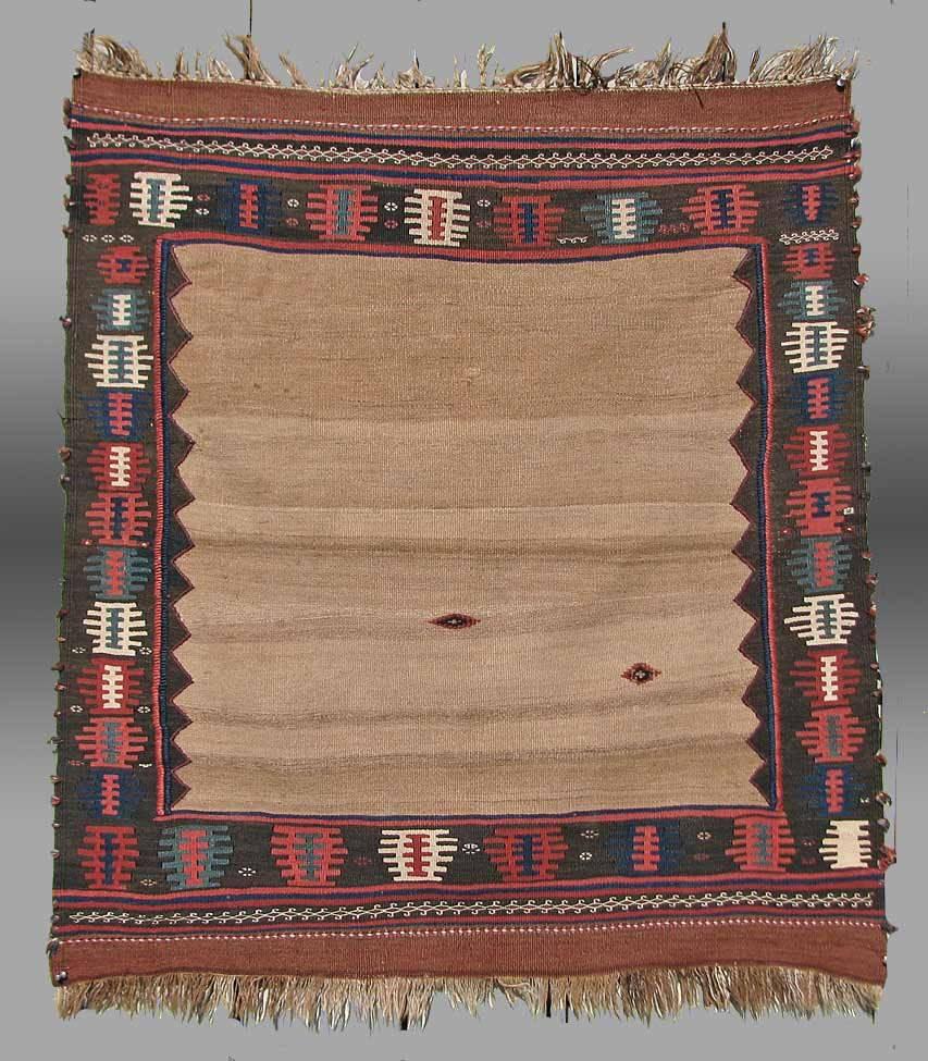 The ru-korsi format of weaving has always been one that people find attractive, presumably because of the minimalist aesthetic. The weave pattern in the borders is reminiscent of some mafrash and bags coming from the Shirvan area of the Caucasus