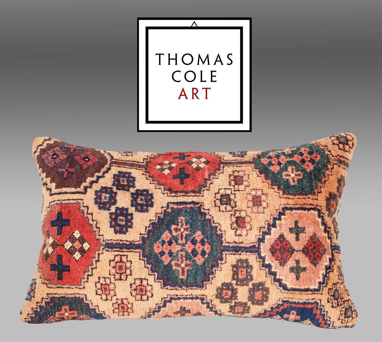 A pillow fashioned from an antique Chodor Turkmen tribal rug. The condition is good, with no holes, repair or stains. All the colors are derived from natural dyes.

It comes with an insert to accomodate the filling.
Filling not provided.

Item
