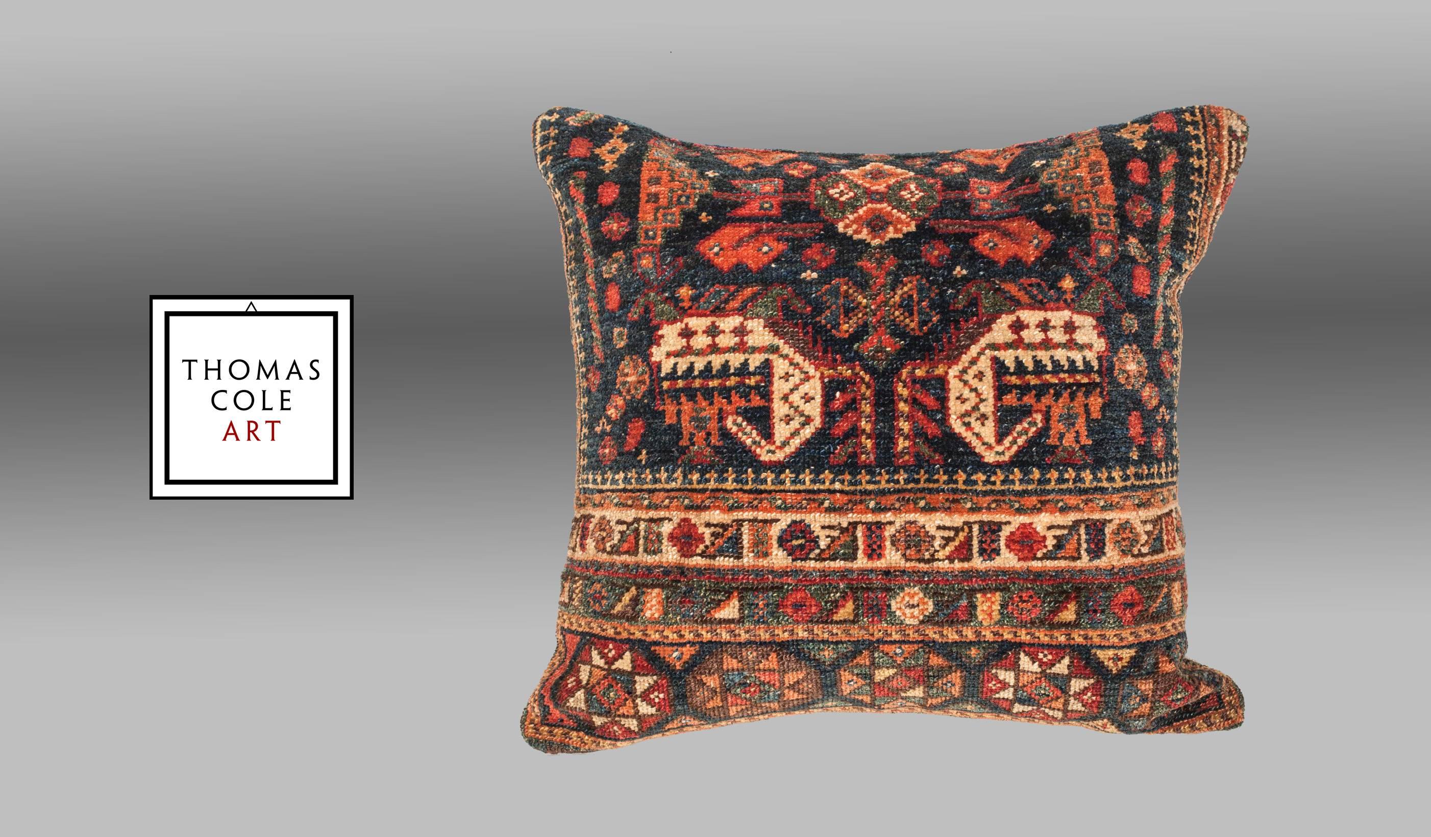 A pillow fashioned from an antique Luri rug from south Persia, dating to the late 19th century.   

It comes with an insert to accommodate filling.

FILLING NOT PROVIDED

The condition is good, with no holes, repair or stains.
