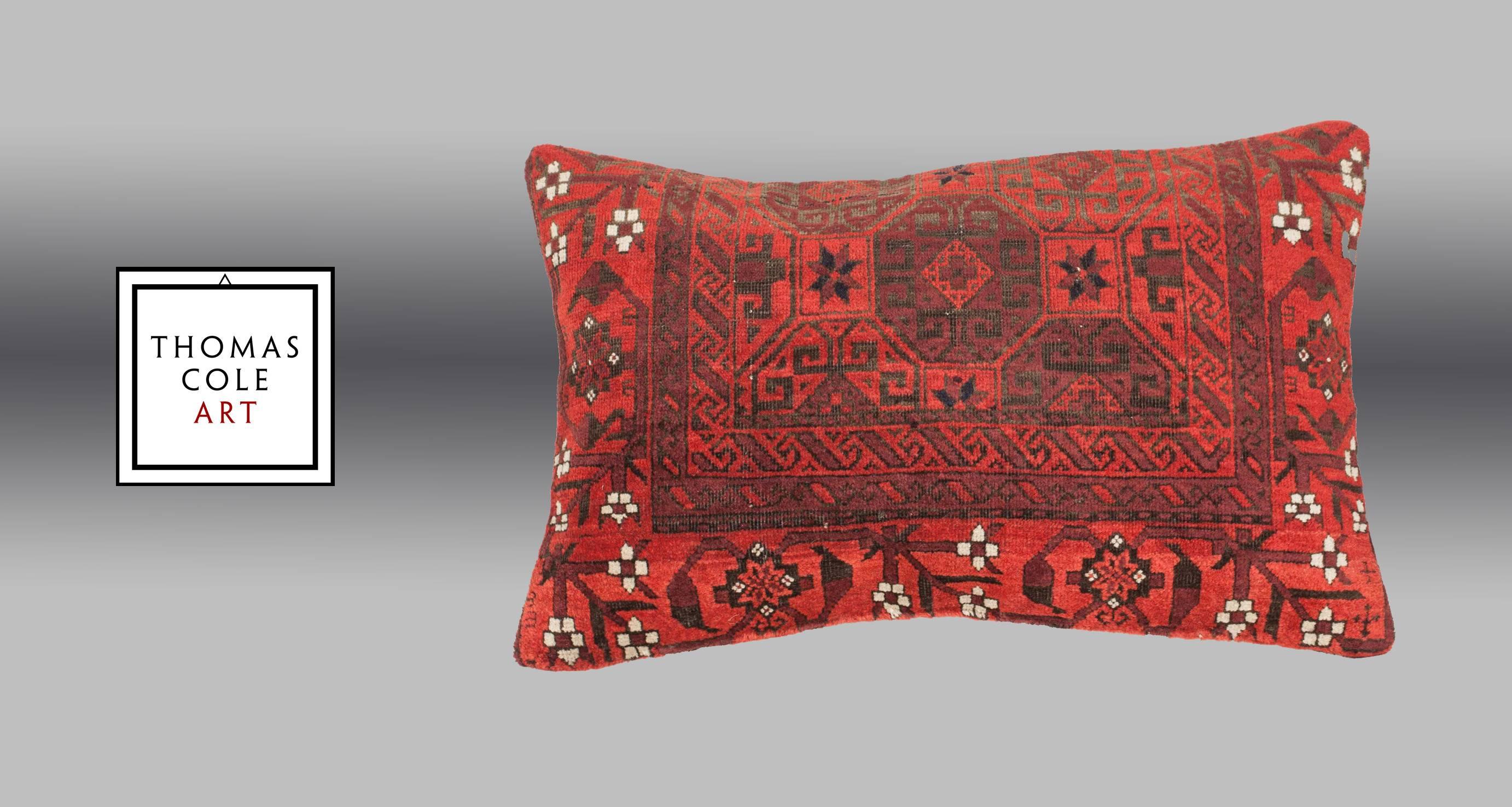 A pillow fashioned from an antique Baluch (Persian tribal) rug from northeast Persia, dating to the late 19th century.   All pillows are constructed with a linen backing cloth.

It comes with an insert to accommodate filling.

FILLING NOT