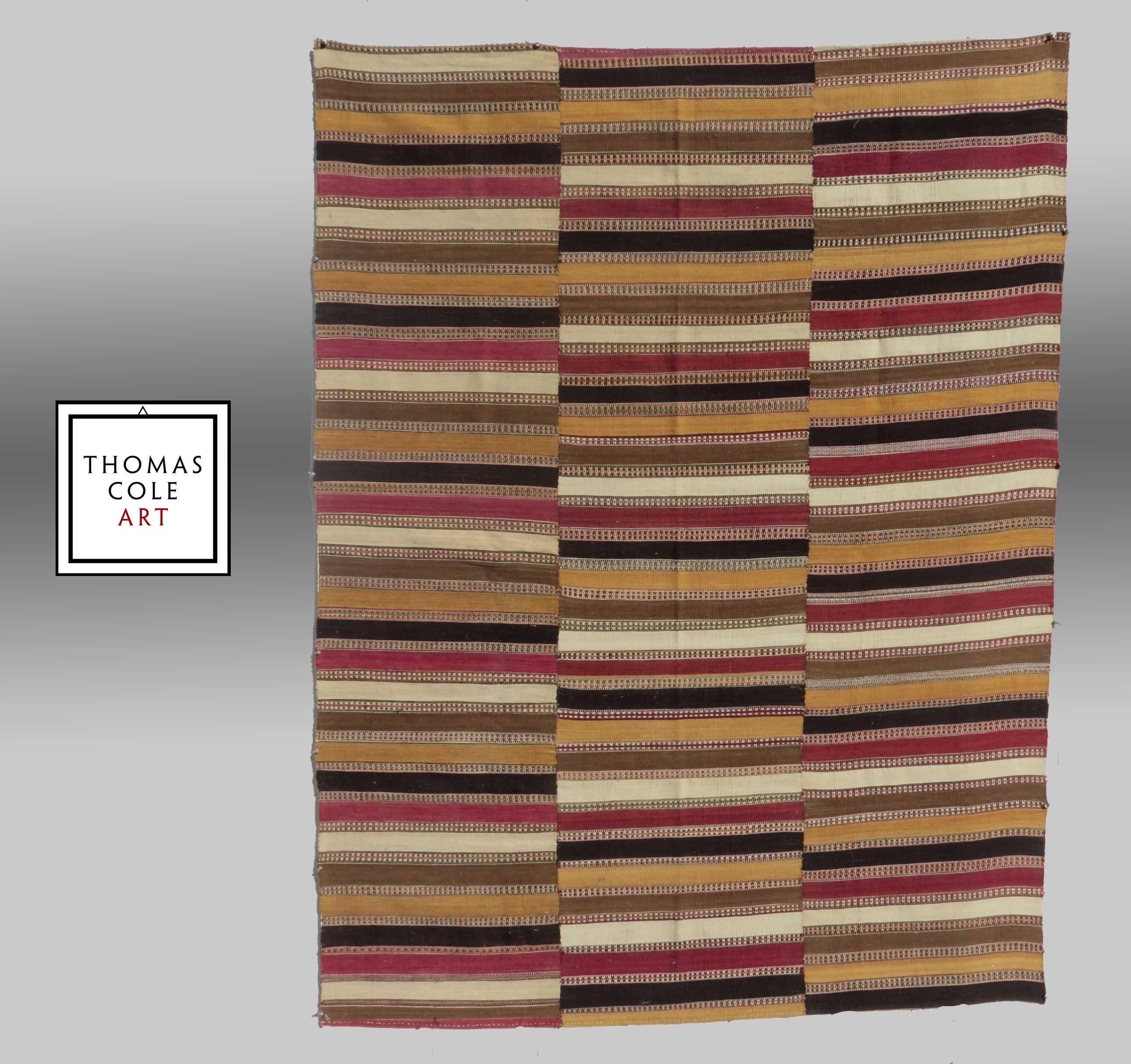 An extremly fine weave seems to be the distinctive characteristic of this visually engaging group of Kilims from northern Iran.

These were used as 