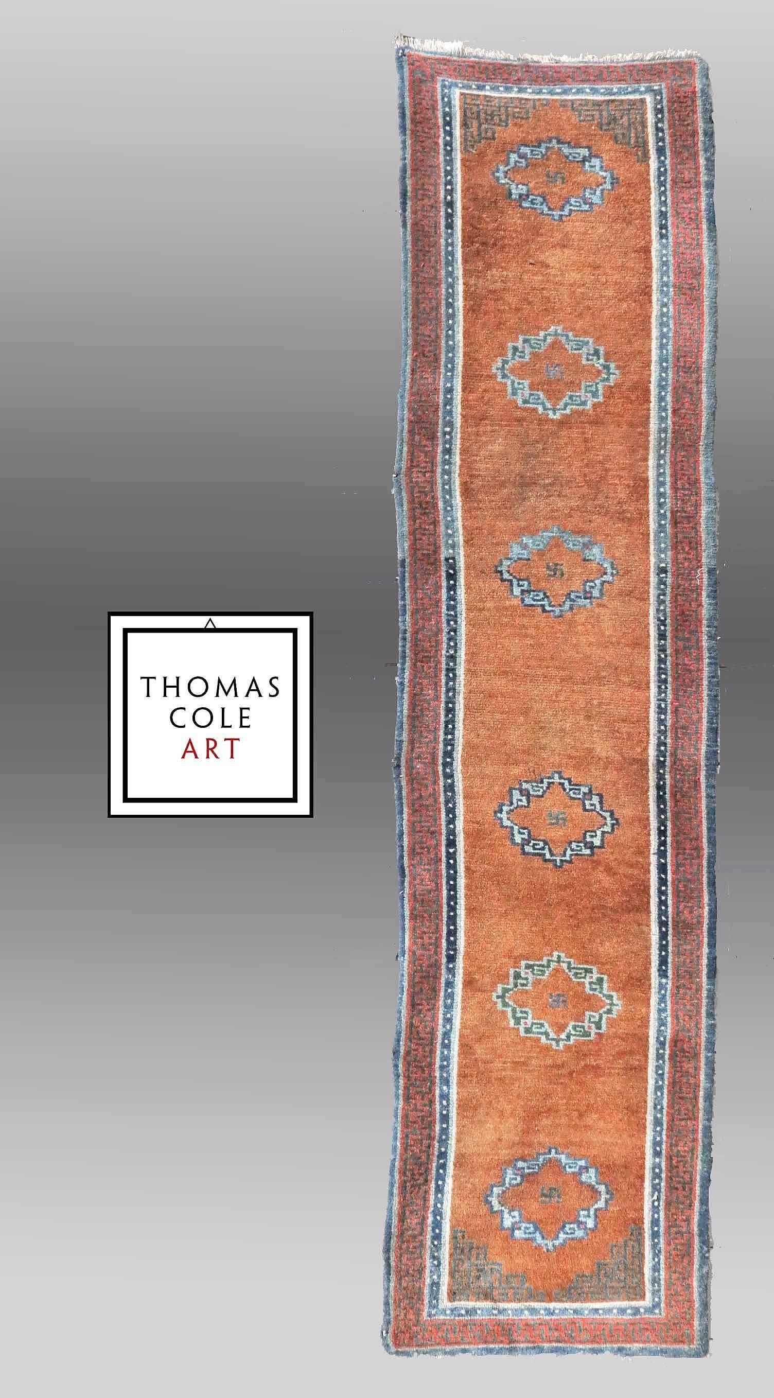 Runners of this type were used in the monasteries of Tibet, set on long benches or cushions upon which monks would sit and chant their prayers. To find a runner in such good condition is rare.

The condition is excellent with virtually full pile,