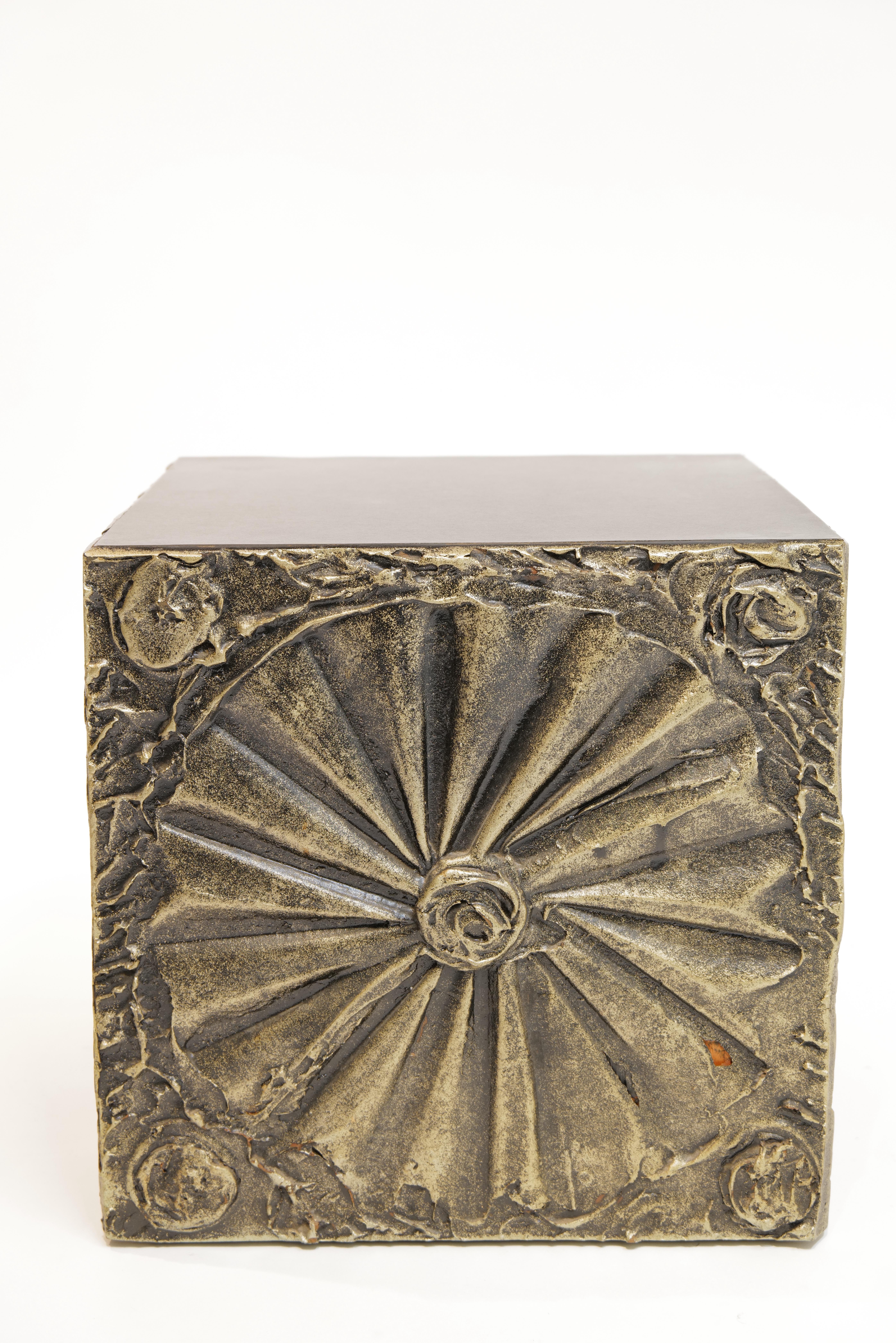 Striking Brutalist “Sculptura” cube side table designed by Adrian Pearsall for Craft Associates, circa 1970s. This sculptural piece features deeply textured resin panels with dynamic geometric and radial motifs on all sides, emblematic of Pearsall’s