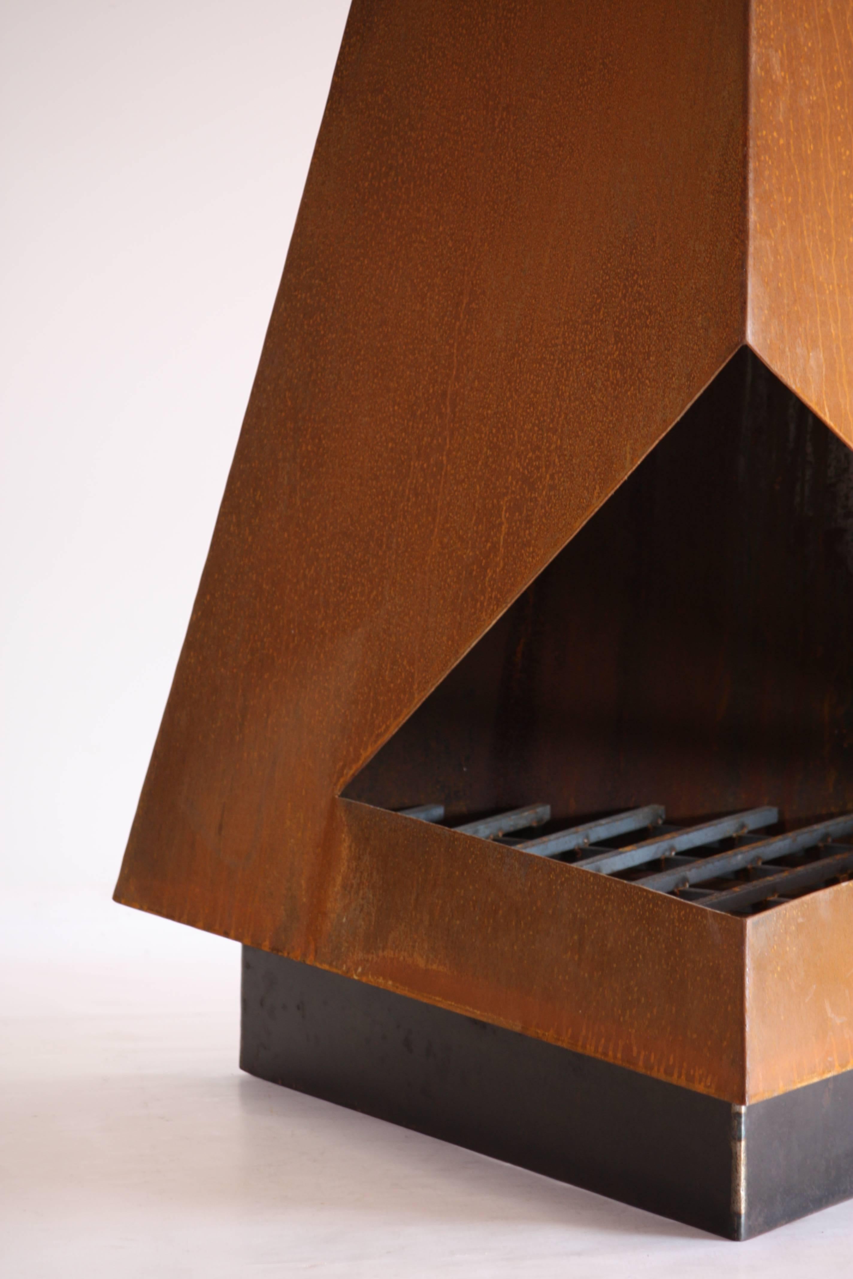 The Thee Steel Chiminea Fireplace by Space 20th Century Modern. This is not your usual Chiminea or Fireplace. This high design, steel sculptural piece will make a statement in any outdoor space. Functionally, it is perfect on that cold evening, but