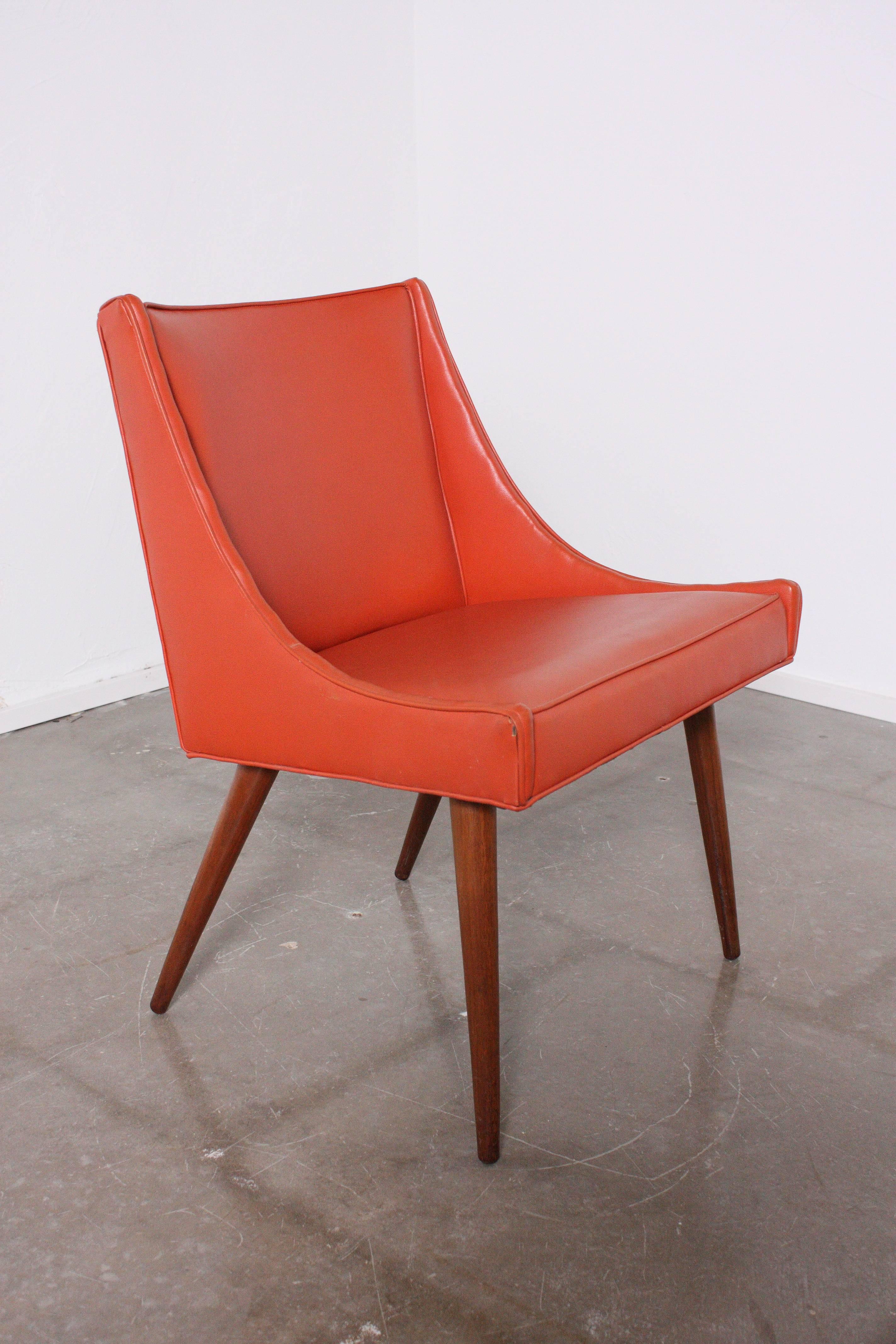 Slipper chair designed by Milo Baughman for Thayer Coggin with original vinyl upholstery. From the curated collection Space 20th Century Modern.