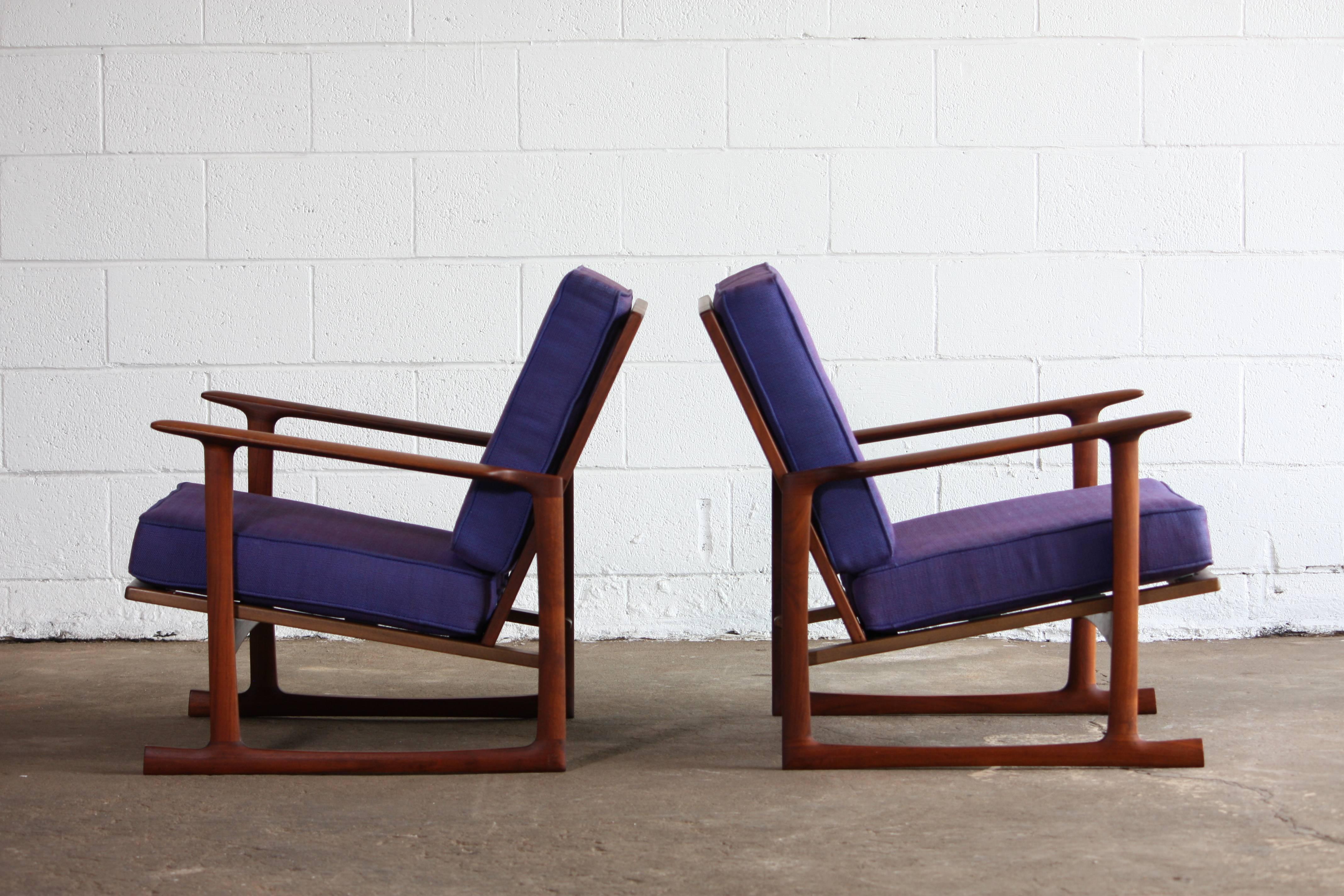 Absolutely stunning pair of lounge chairs designed by IB Kodod Larsen for Selig. Both retaining Made in Denmark badge. Thought to be original fabric, foam replaced with new. From the curated collection Space 20th Century Modern.