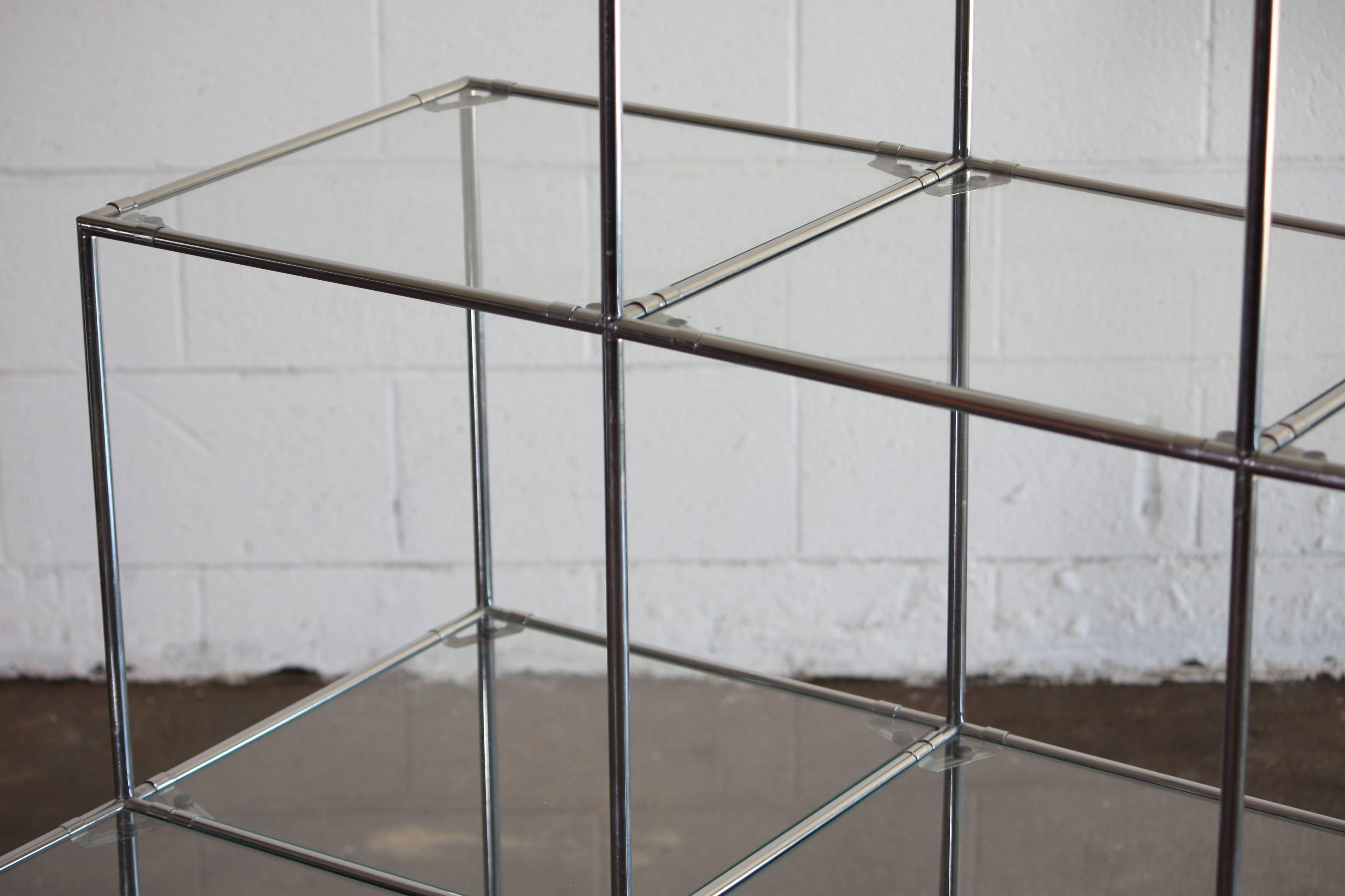 chrome and glass shelf unit