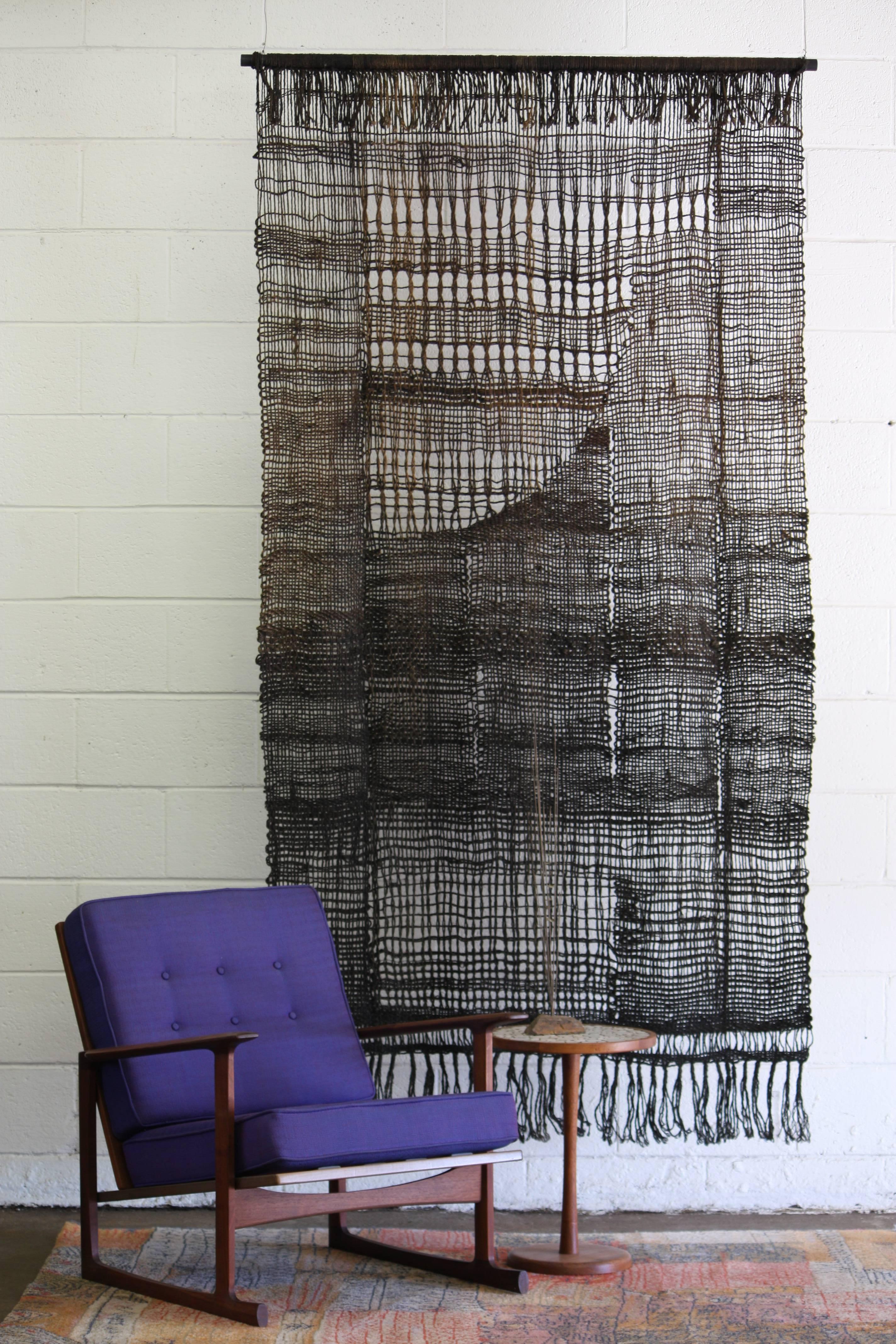 Amazing off loom wool weaving with geometric patterns and ever so slight ombré coloring. From the curated collection Space 20th Century Modern.