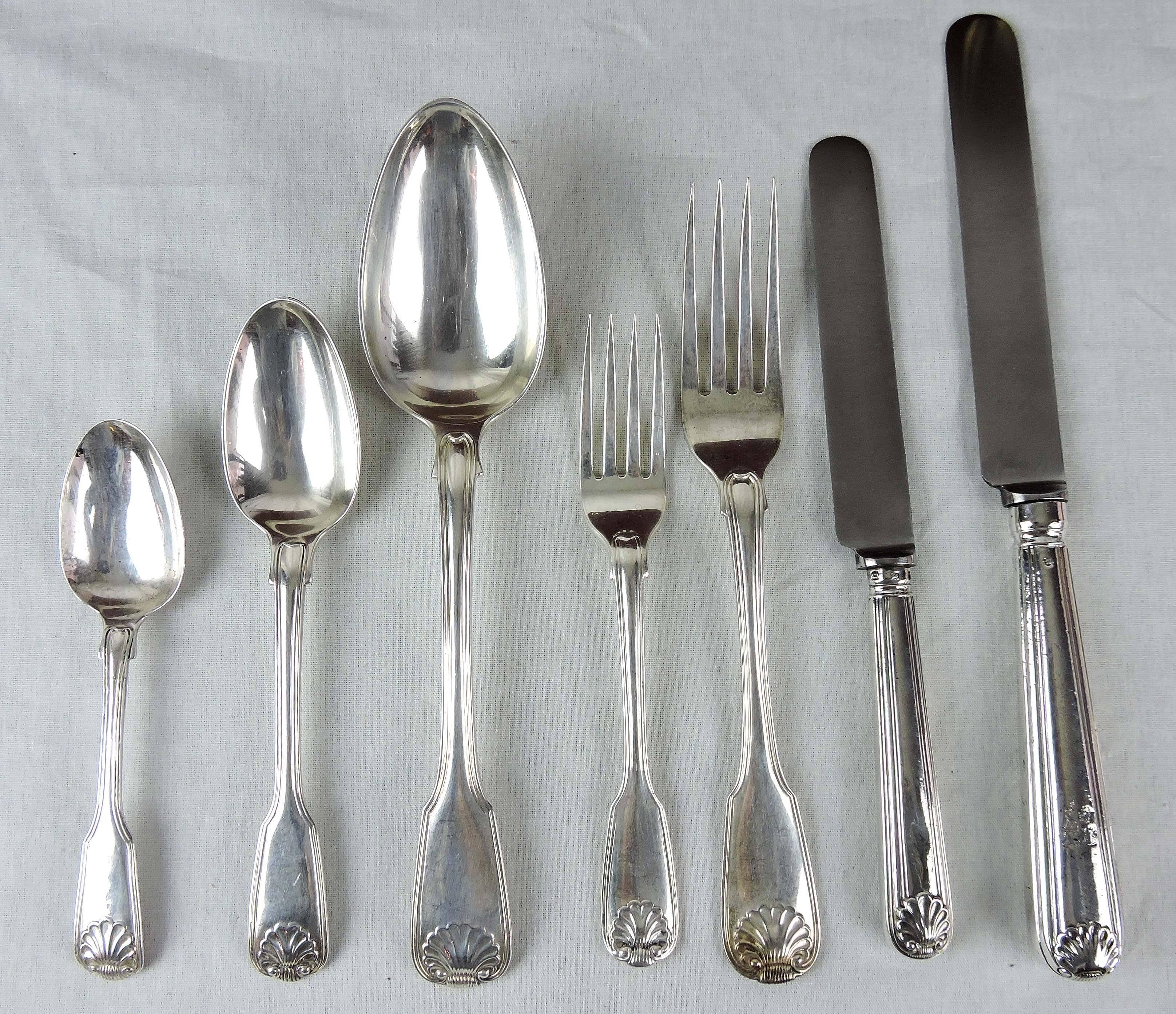 This double-struck flatware service in fiddle, shell and thread pattern was variously made by William Eley, William Fearn and William Chawner I & II in London between 1809 and 1832, with the exception of the knives which were made in Sheffield by