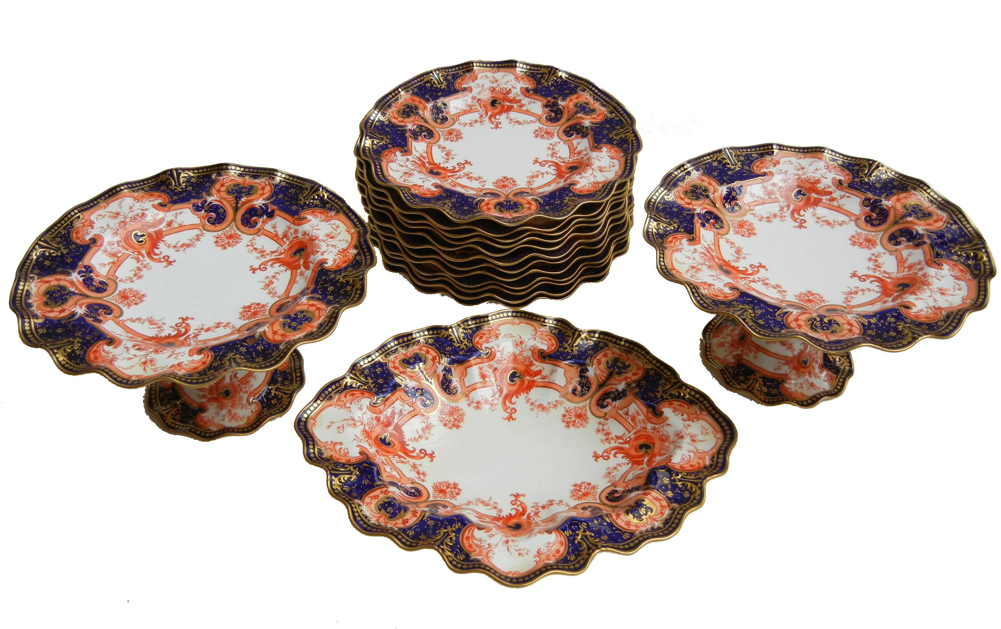 Outstanding quality, each plate has a wavy fluted rim.

Consisting of twelve dessert plates, two pedestal compotes and oval serving dish. Imari decoration - pattern #5714.

Plates are fully decorated on the fronts. Pedestal compotes and fully