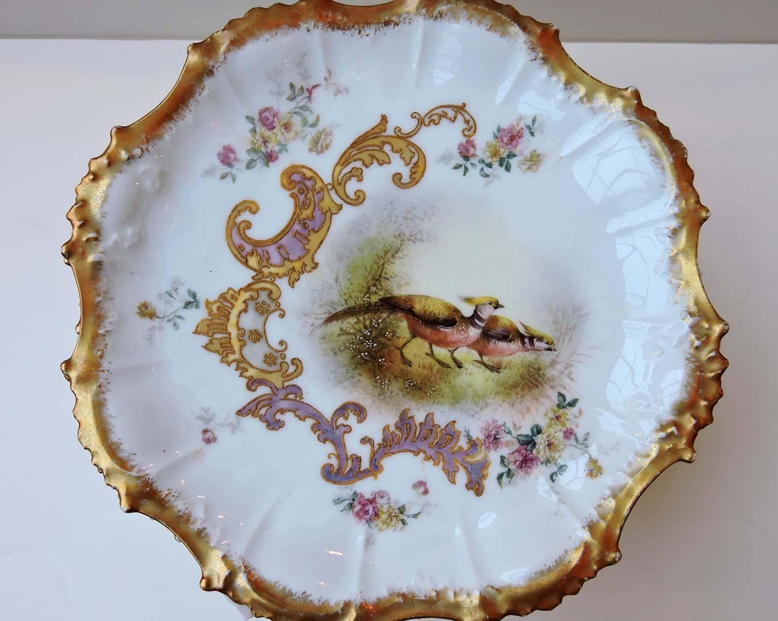 Porcelain Set of 11 Limoges Plates Hand-Painted with Game Birds