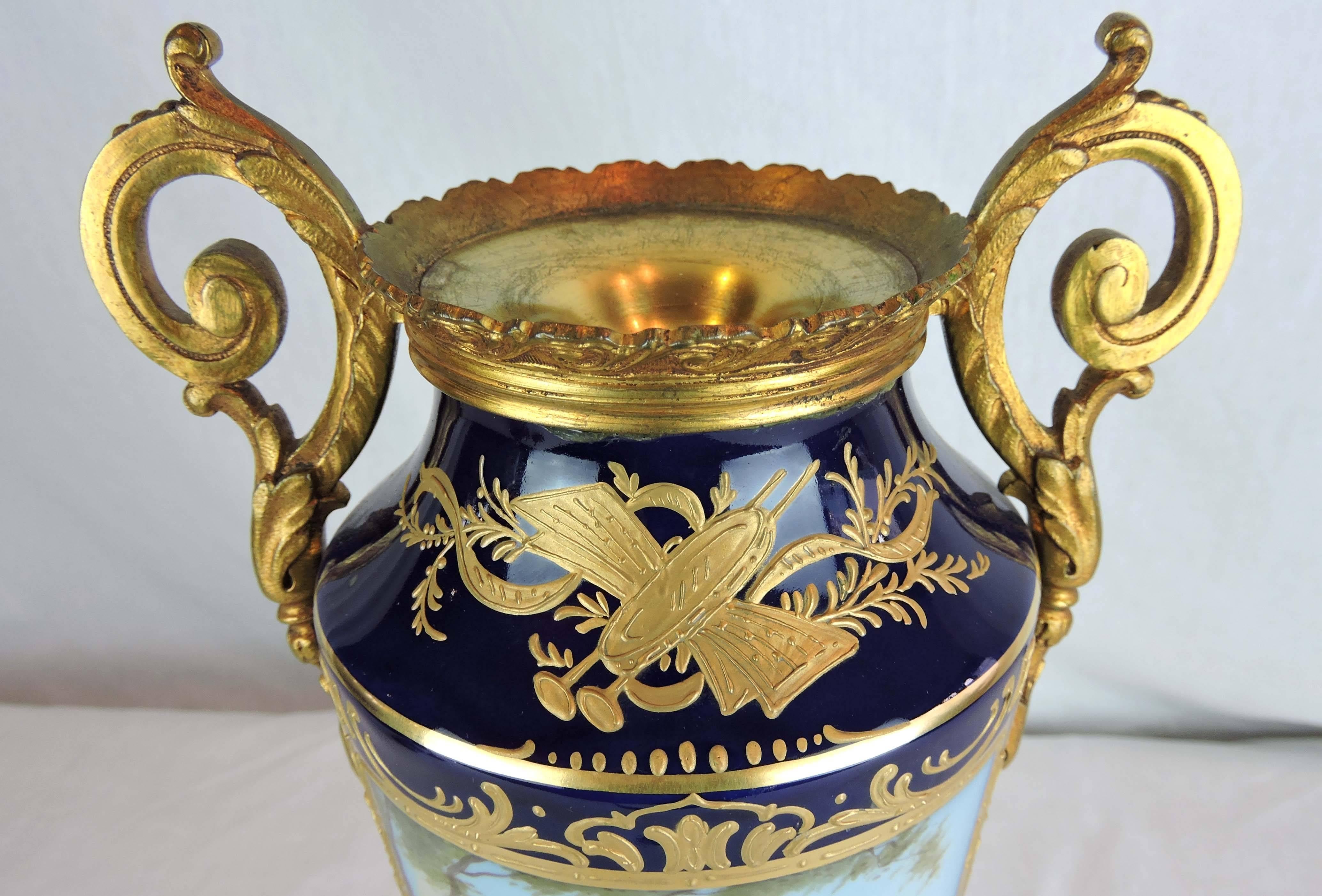 Pair of French Sevres Style Porcelain and Gilt Bronze Lidded Baluster Urns For Sale 2