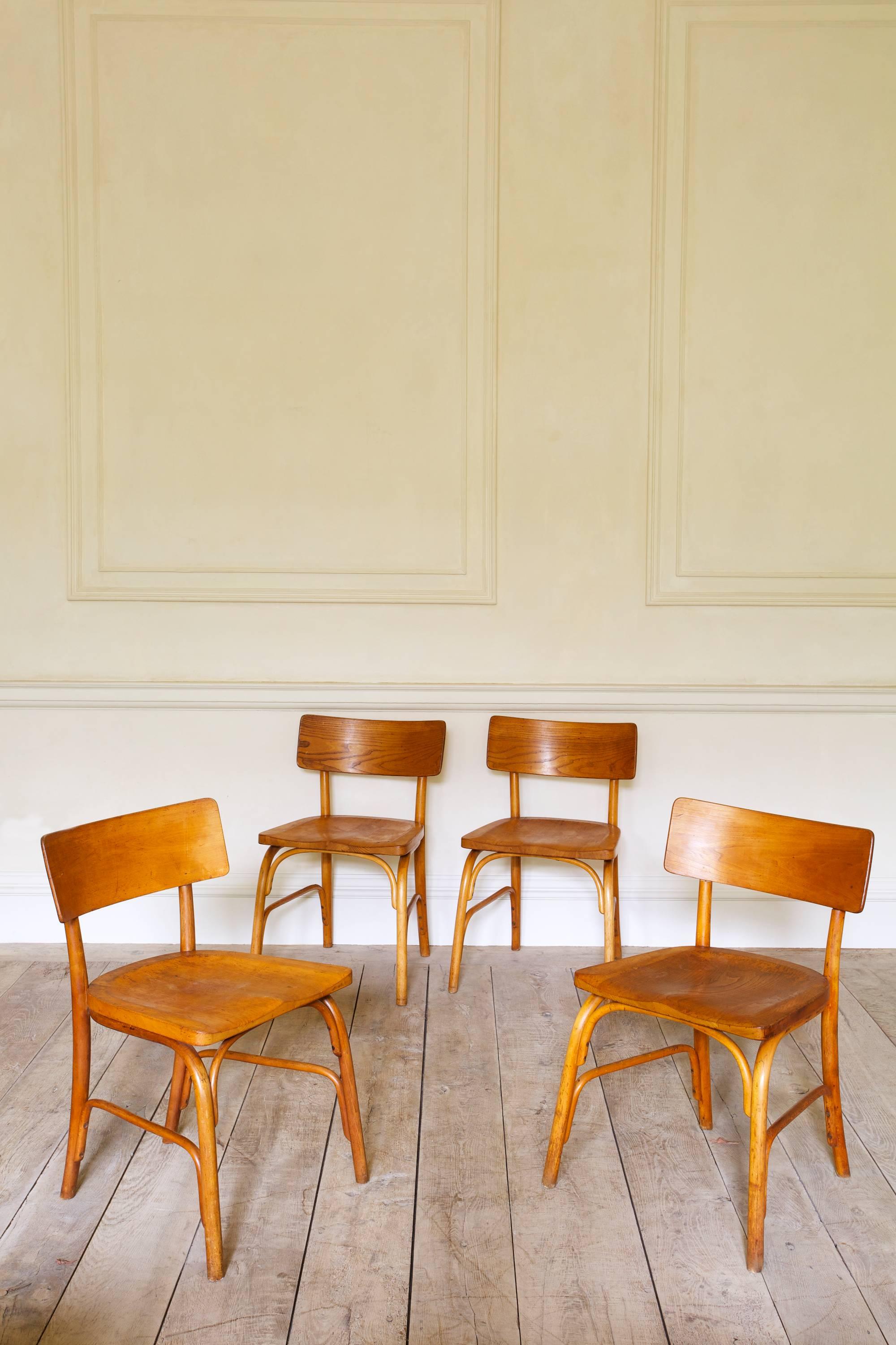 Beech bentwood with shaped solid elm seat and back, all with a fine aged patina. Designed in 1930 by Frits Schlegel and subsequently manufactured by Fritz Hansen.