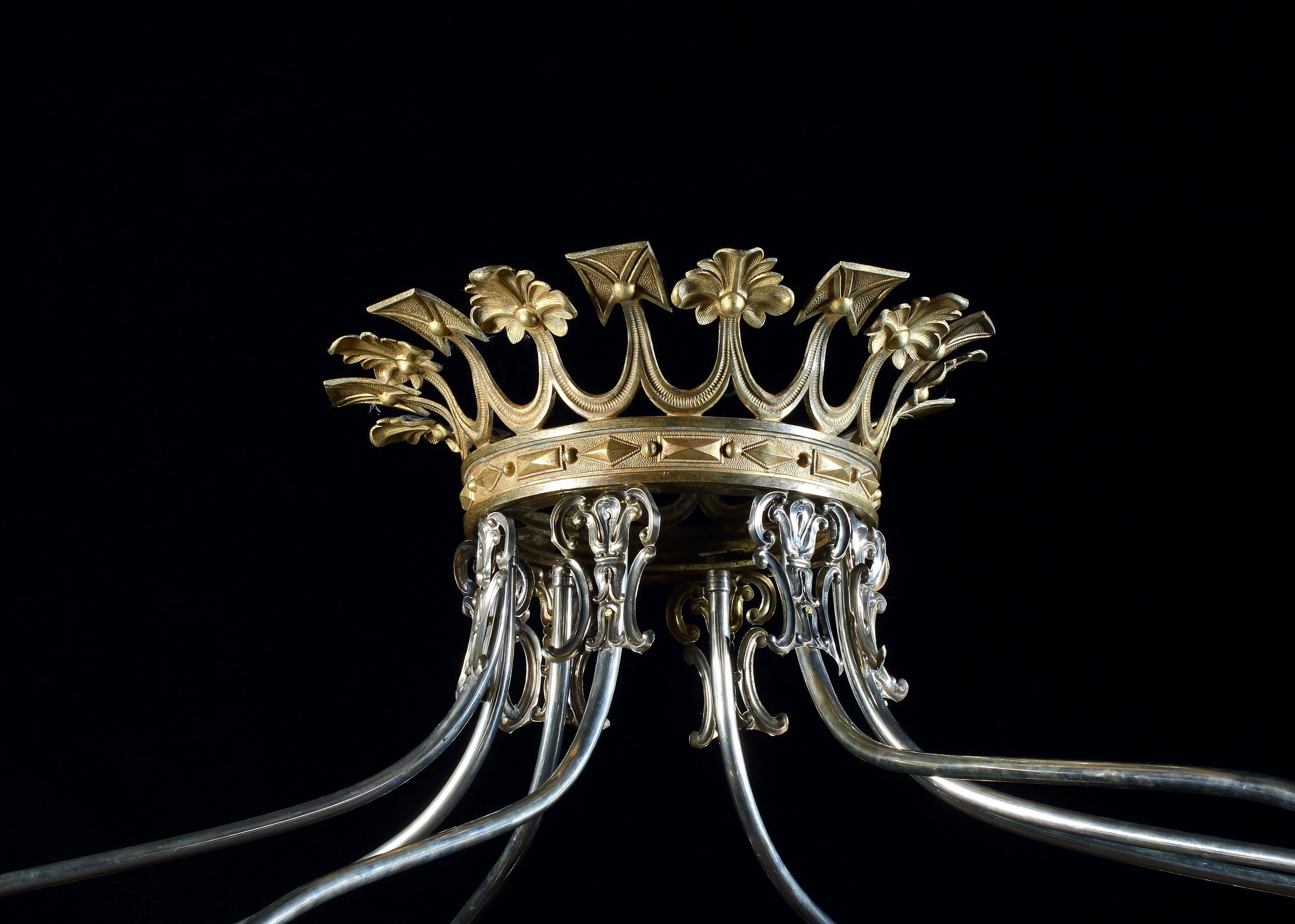 Silvered pressed metal and parcel gilt four poster bed, England, circa 1860

Stamped throughout with the diamond registration mark.

In this superb example of Winfield’s renowned output, the canopy is surmounted by a gilded coronet with eight
