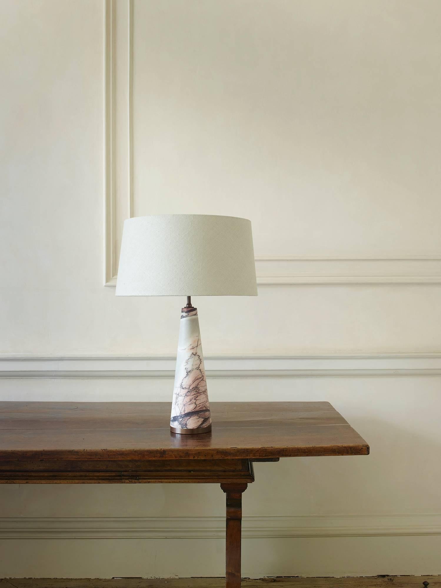 Ru Editions.

A limited edition of seven Breccia Violetta marble cone lamps. Please enquire as to stock.

Turned in solid marble with dark bronze fittings.

                 