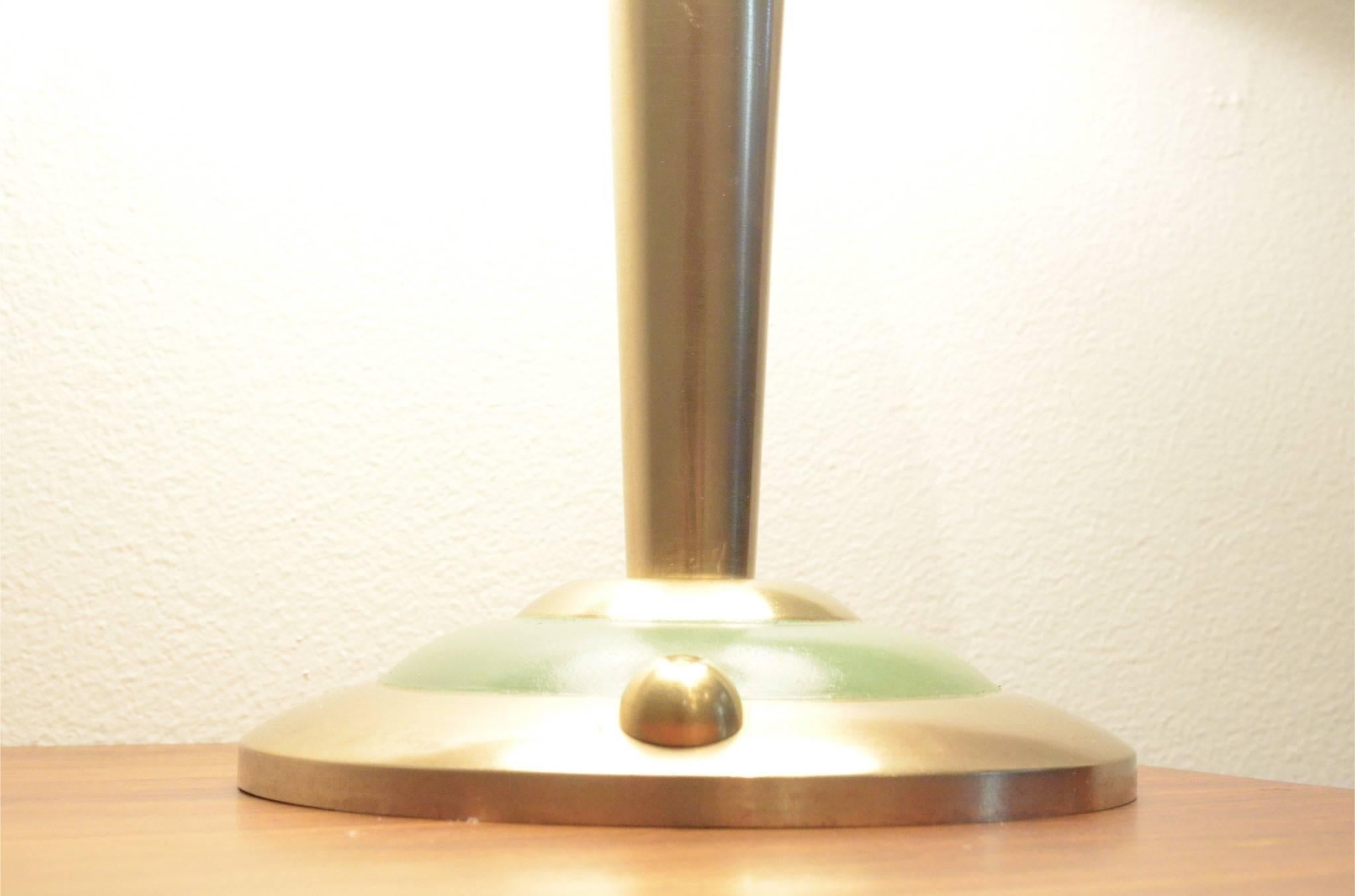 Nice Art Deco period table lamp composed of full brass base / rod / dome with accents of pastel green paint.