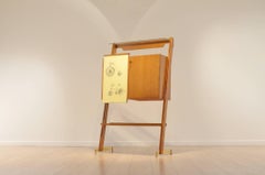 Mid-Century Italian Design Fornasetti Style Bar Cabinet in Oak & Yellow Formica
