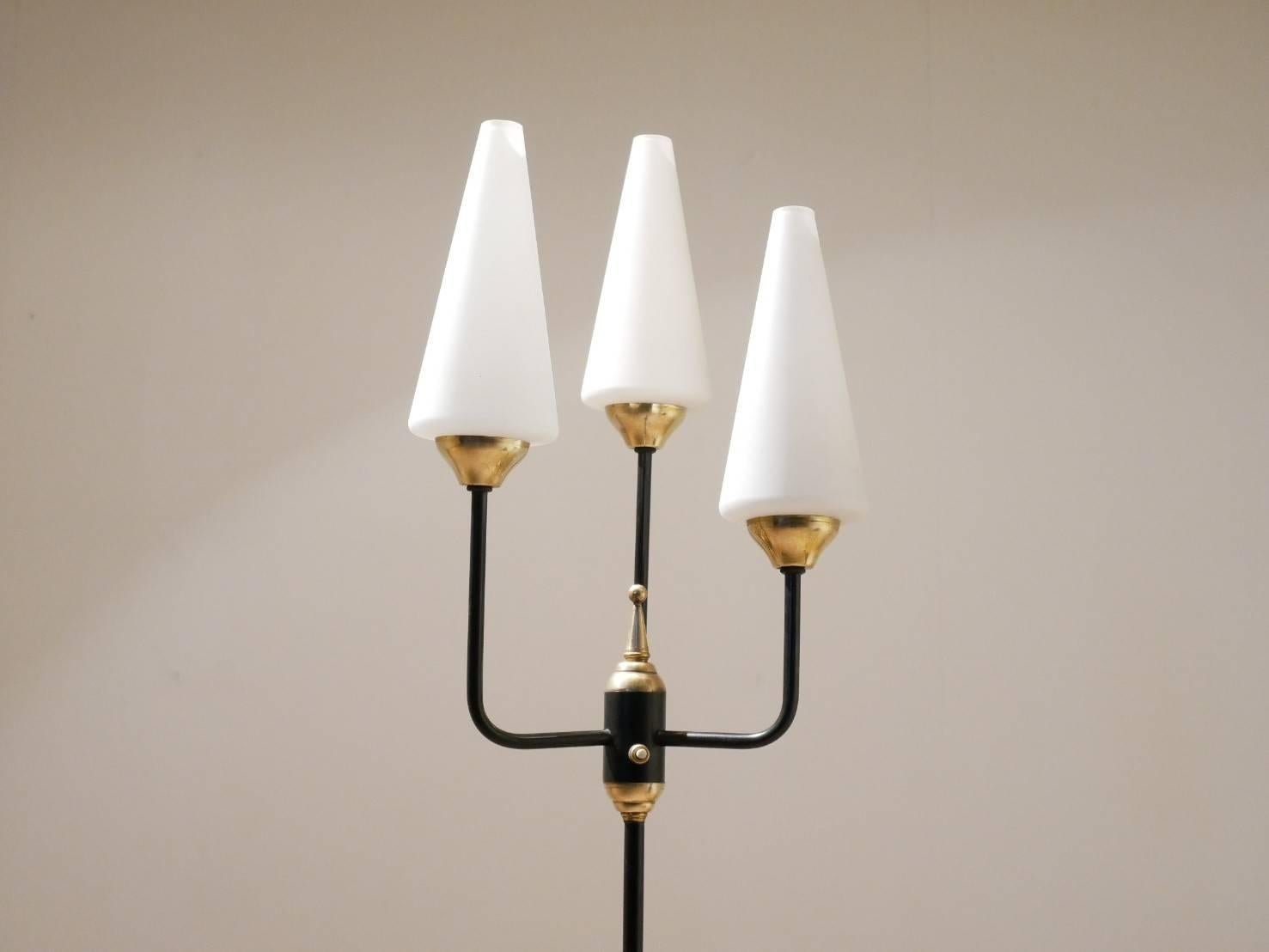 Midcentury, French floor lamp from Maison Arlus, tripod metal feet and central rod matched with brass accents. 3x opalescent glass diffusers.
Lamp is fitted with new E14 sockets.