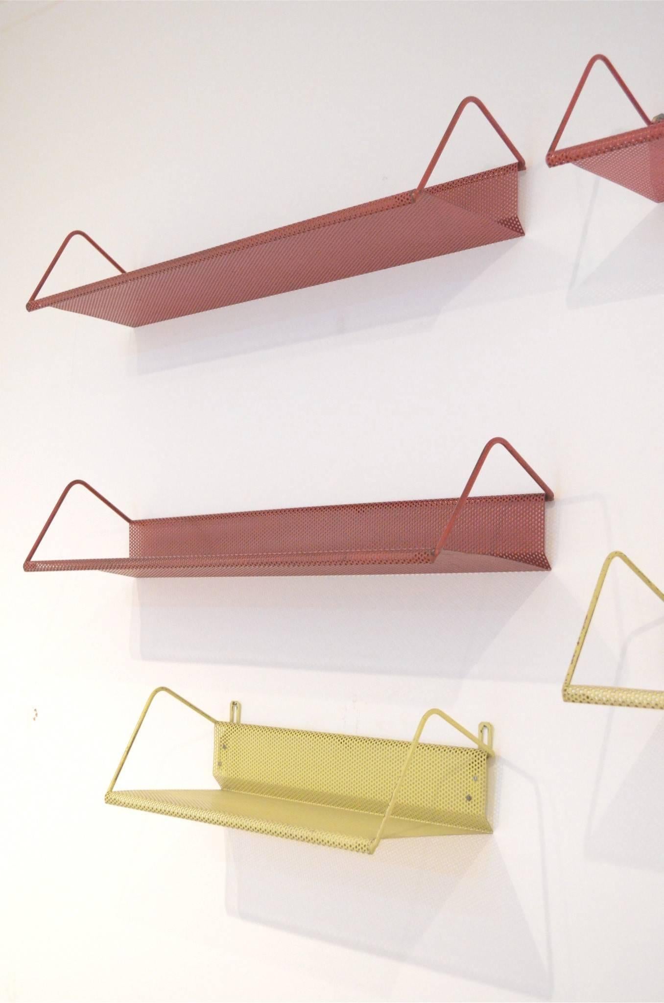 Rare and large set of eight tricolor metal shelving units from Mathieu Mate´got for Artimeta. Planks come in black/ yellow/ red.

Dimensions in cm:
19.5 x 50 x 15 cm.