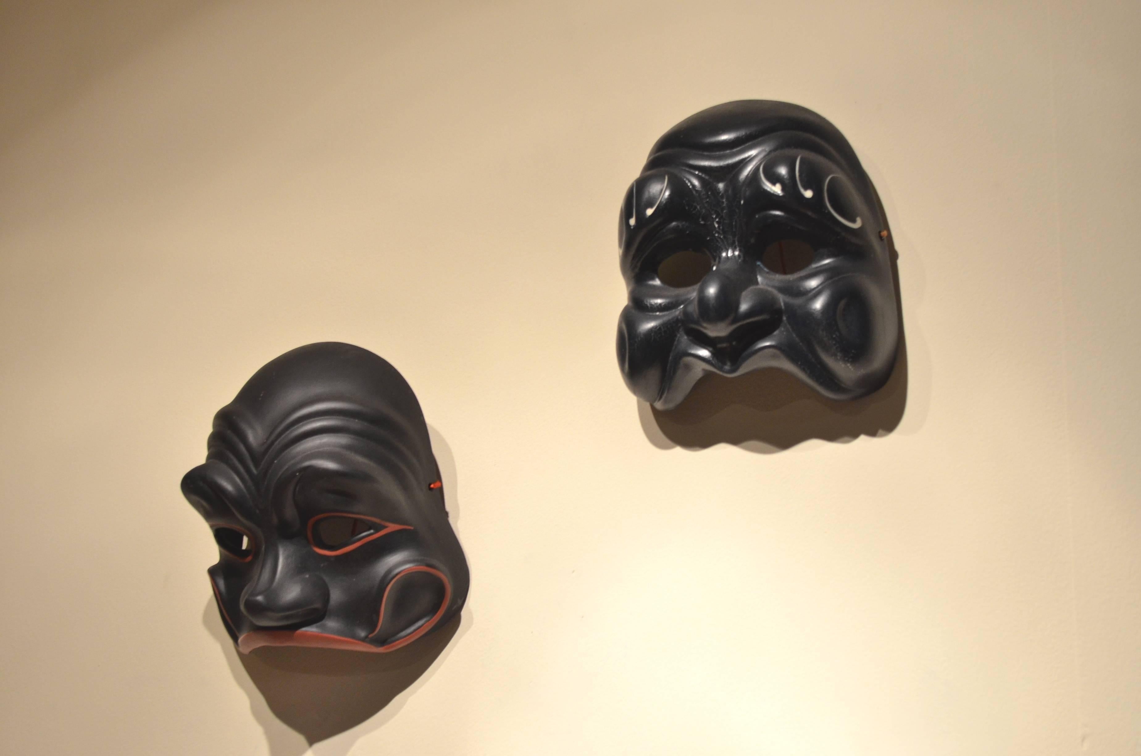 Collection of 11x Venetian masks made in plaster. The collection is composed of : 
- 2x Bauta masks, one in Black and the other in White, 
- 1 x Red Clay coloured Pulcinella mask with angry expression 
- 1 x White female Arlecchino mask, with