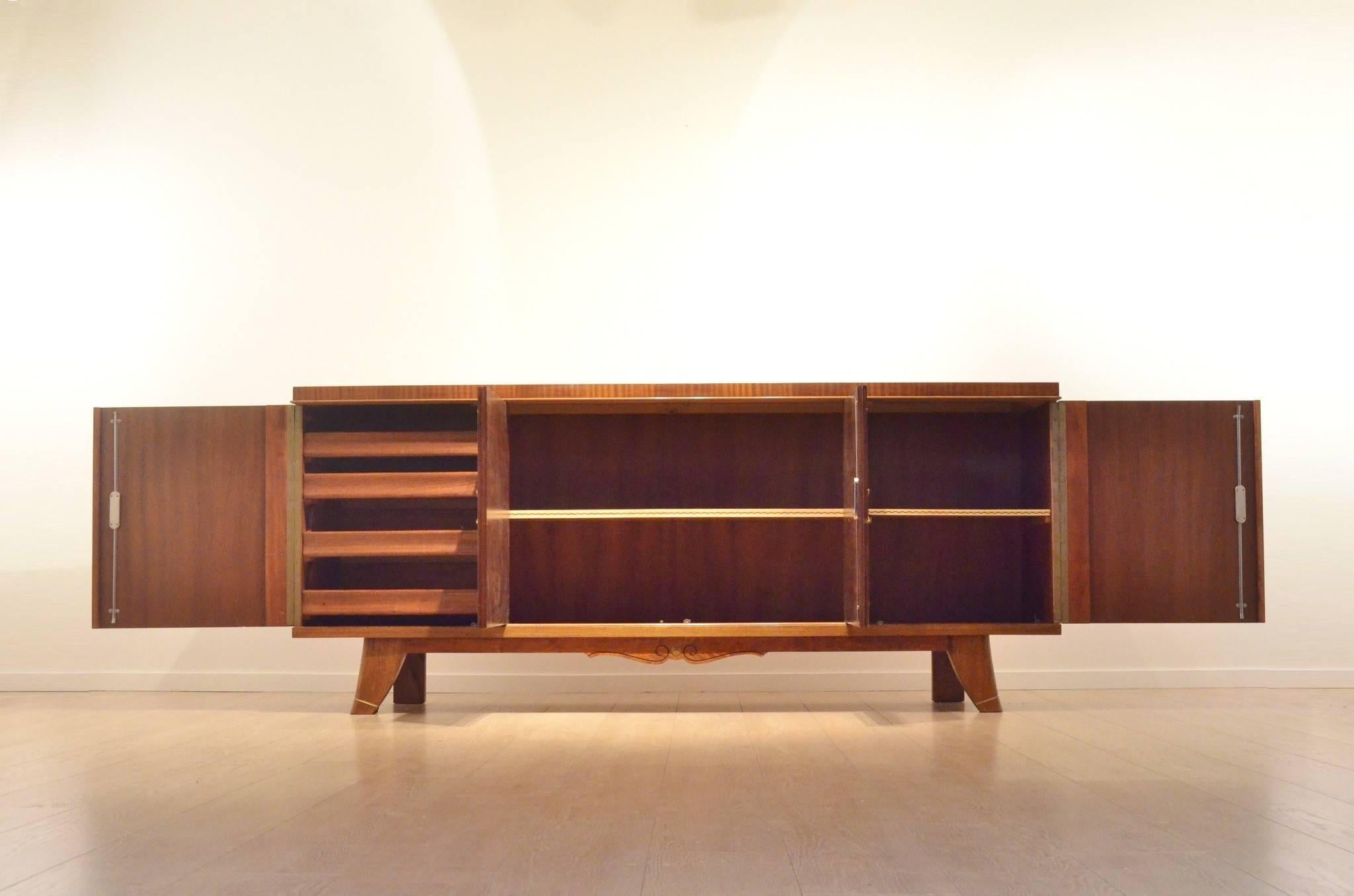 Extra large sized Mid-Century sideboard from De Coene - outstanding crafting quality with a neoclassic style design. Mahogany and walnut veneered corpus / brass inserts.