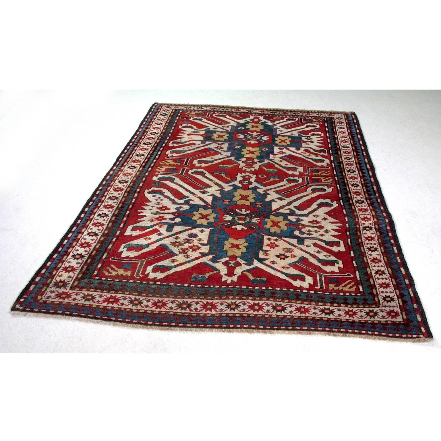 Antique Eagle Kazak Chelaberd from Karabagh area. Some old negligible repairs. Soft shiny silky wool. Brown/back corrosion. Natural dyes, circa 1870.