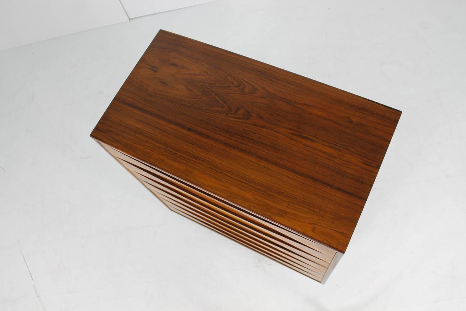 Beautiful Danish modern design Arne Vodder chest of seven drawers in a very good condition. This is a very rare model in authentic condition, from the 1960s Danish modern design.