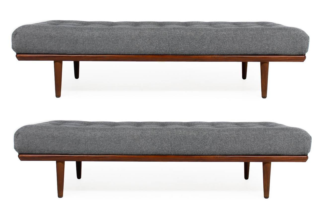 Fantastic set of 2 Hans J. Wegner daybeds, Mod. GE 19 for GETAMA, Denmark. Very good condition, the original innerspring matress was reupholstered and covered with new woven fabric in grey, also the backrest which is really rare can be used against